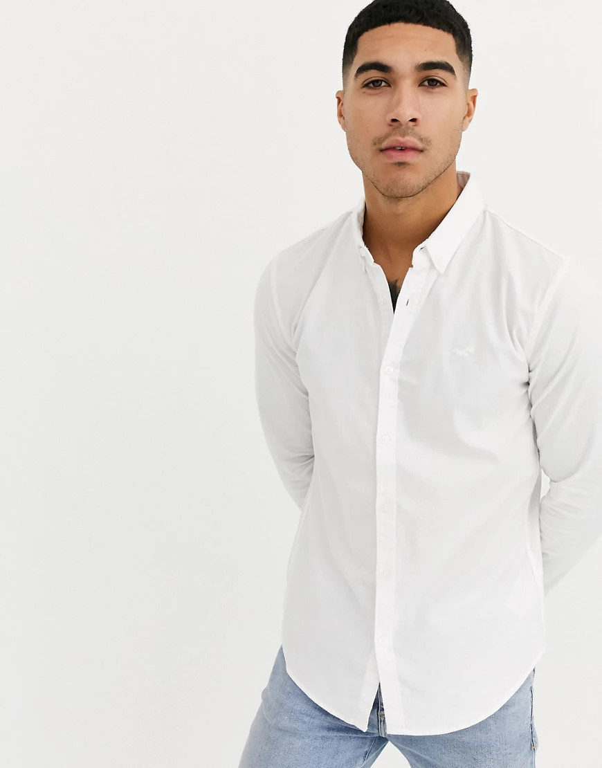 Hollister icon logo muscle fit buttondown oxford shirt in white | ASOS (Global)