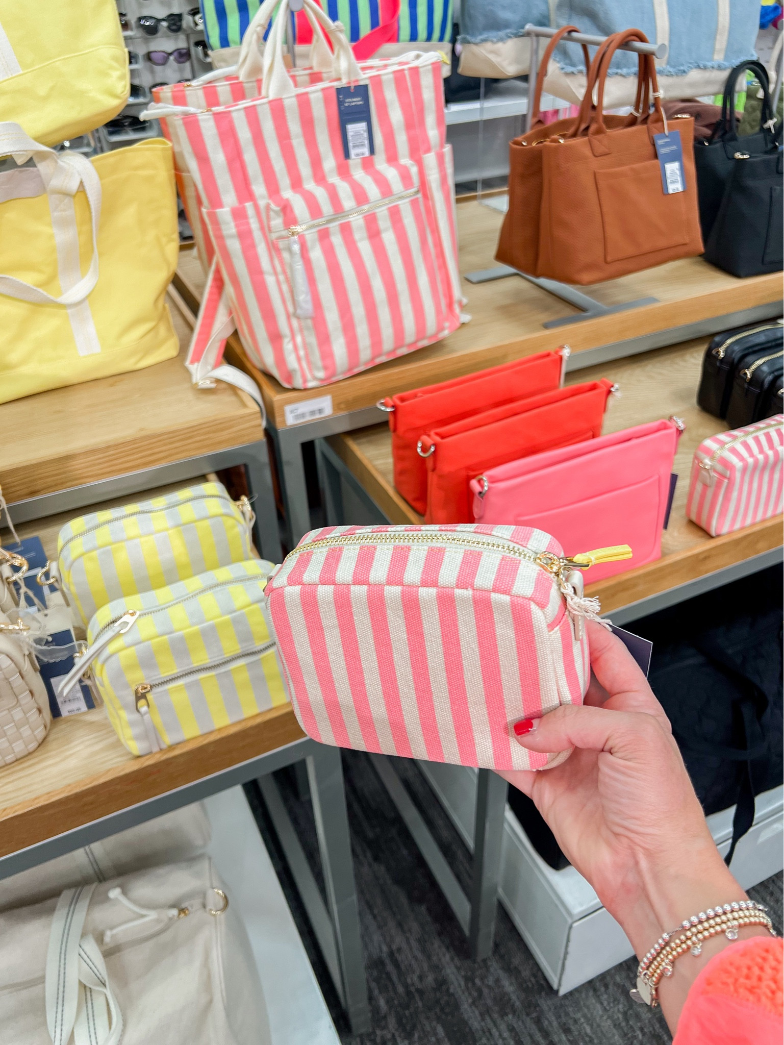 Striped purses and handbags perfect for spring and summer travel! 

#LTKstyletip #LTKitbag #LTKSeasonal
