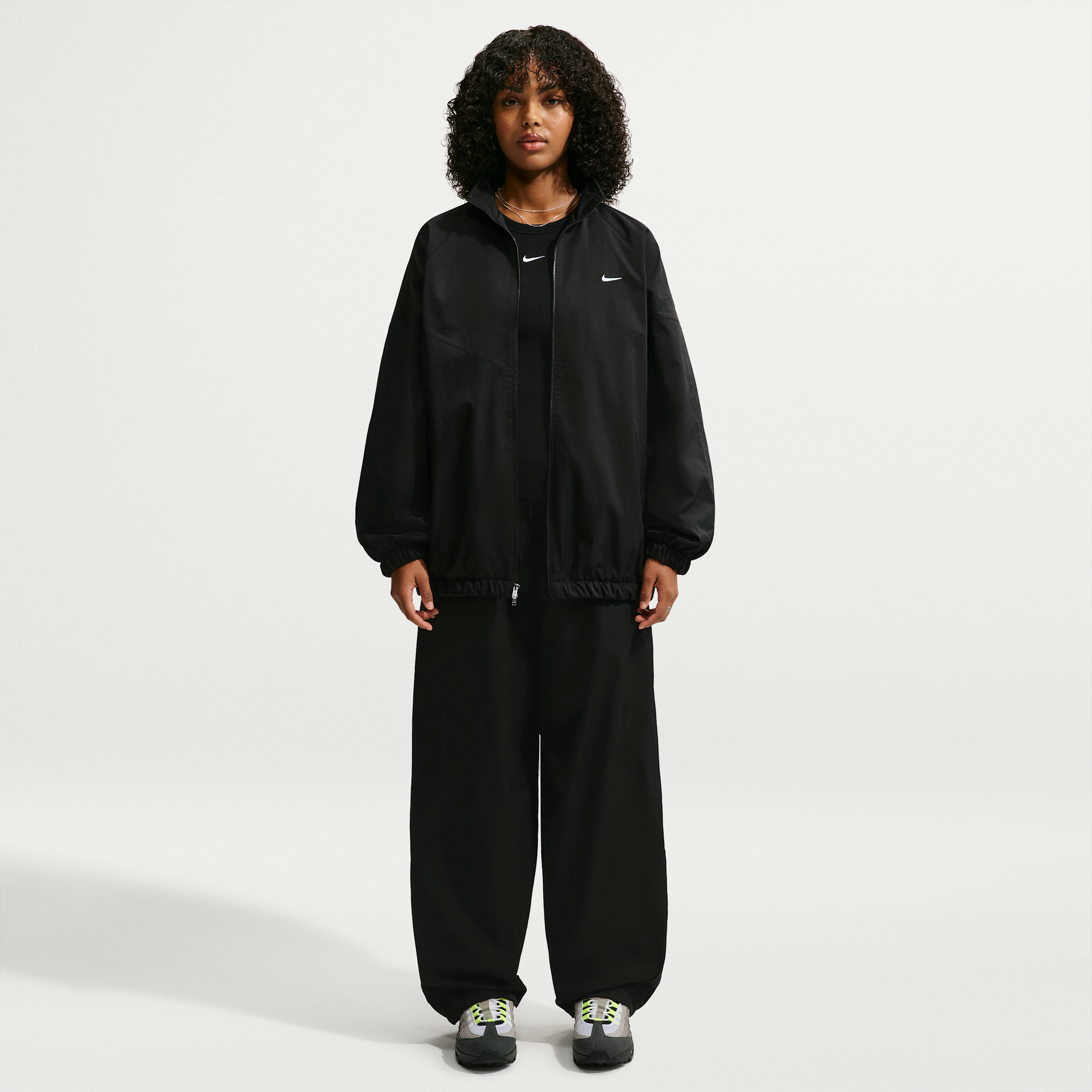 Women's Nike Sportswear Loose High-Waisted Track Pants in Black | IQ3166-010 | Nike (US)