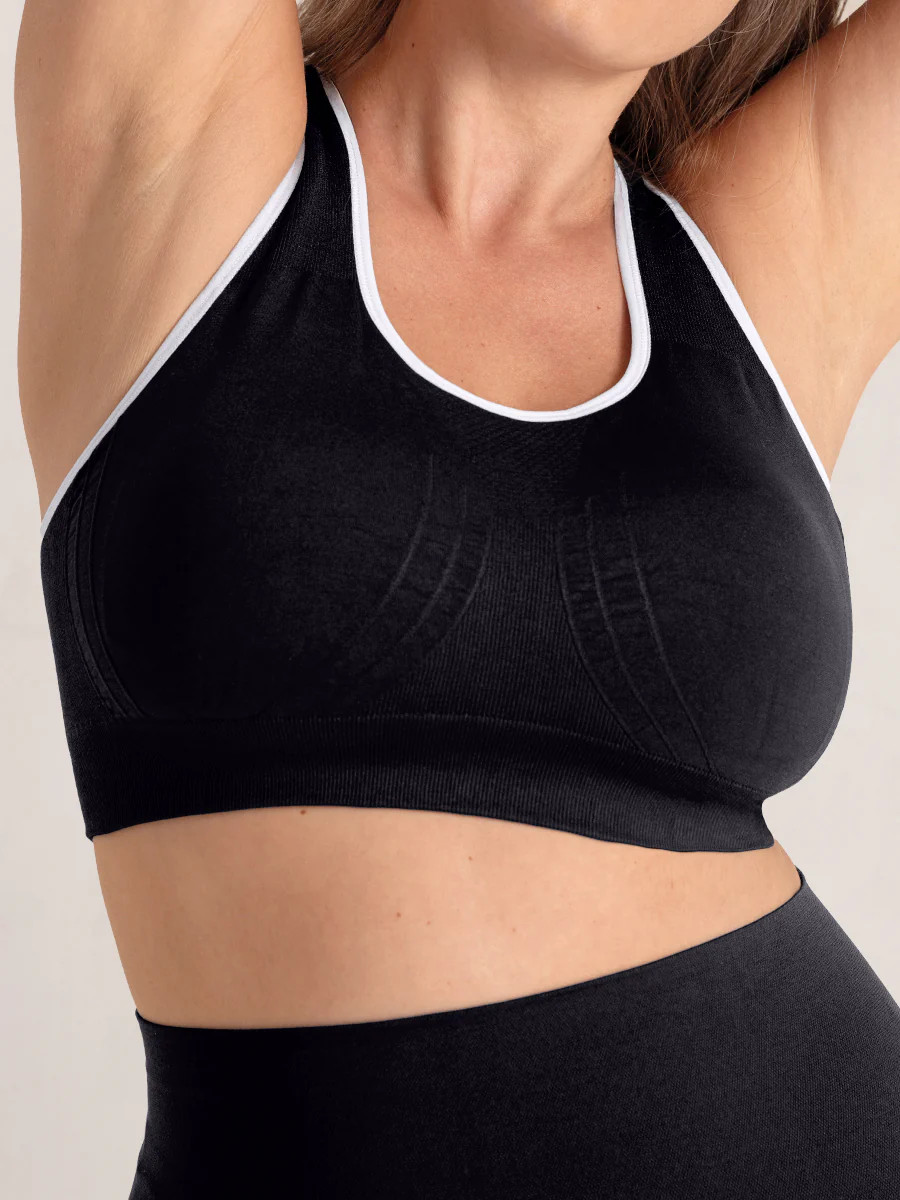 Truekind® Seamless Racerback Sports Bra | Shapermint