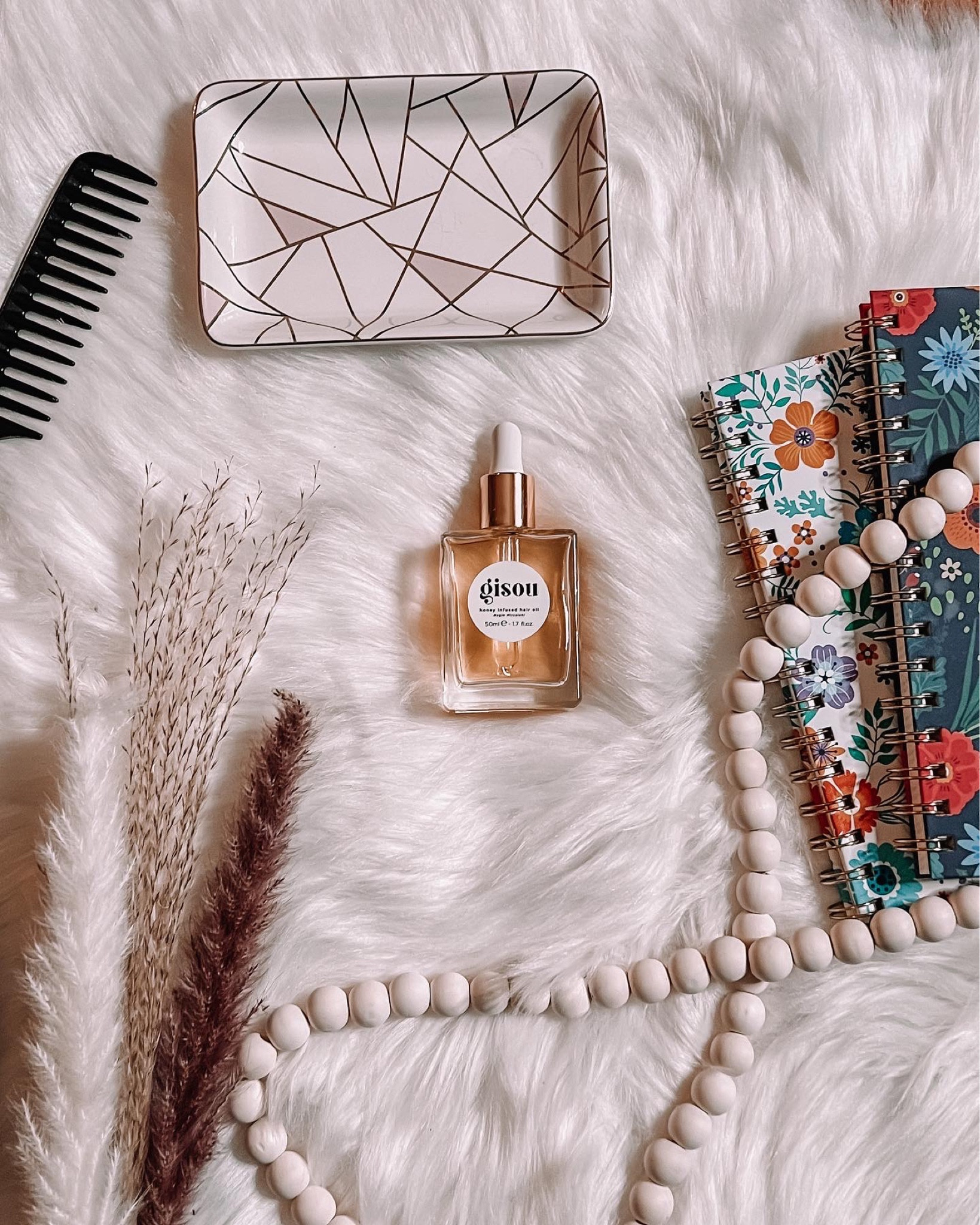 Gisou hair oil. Hair oil. Haircare. Hair. Haircare routine. Hair routine. Honey infused hair oil. 

#LTKunder50 #LTKbeauty #LTKstyletip