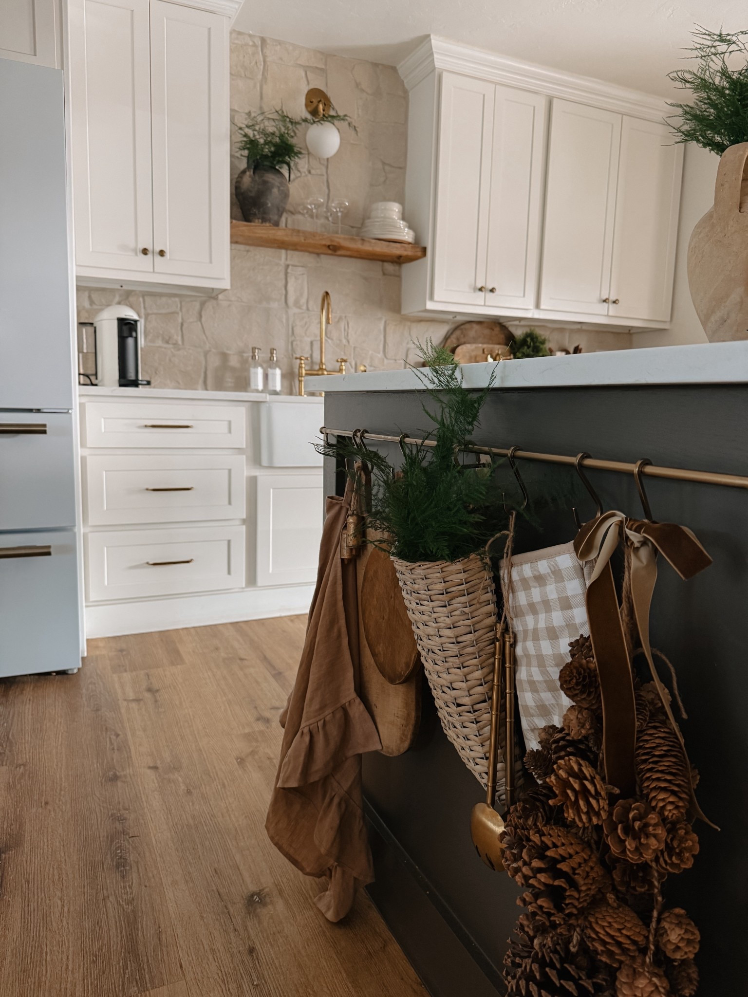 Kitchen styling for Christmas and winter! I love this affordable hanging basket to hold some fresh greenery. It can be used for every season! 

#LTKSeasonal #LTKHoliday #LTKHome