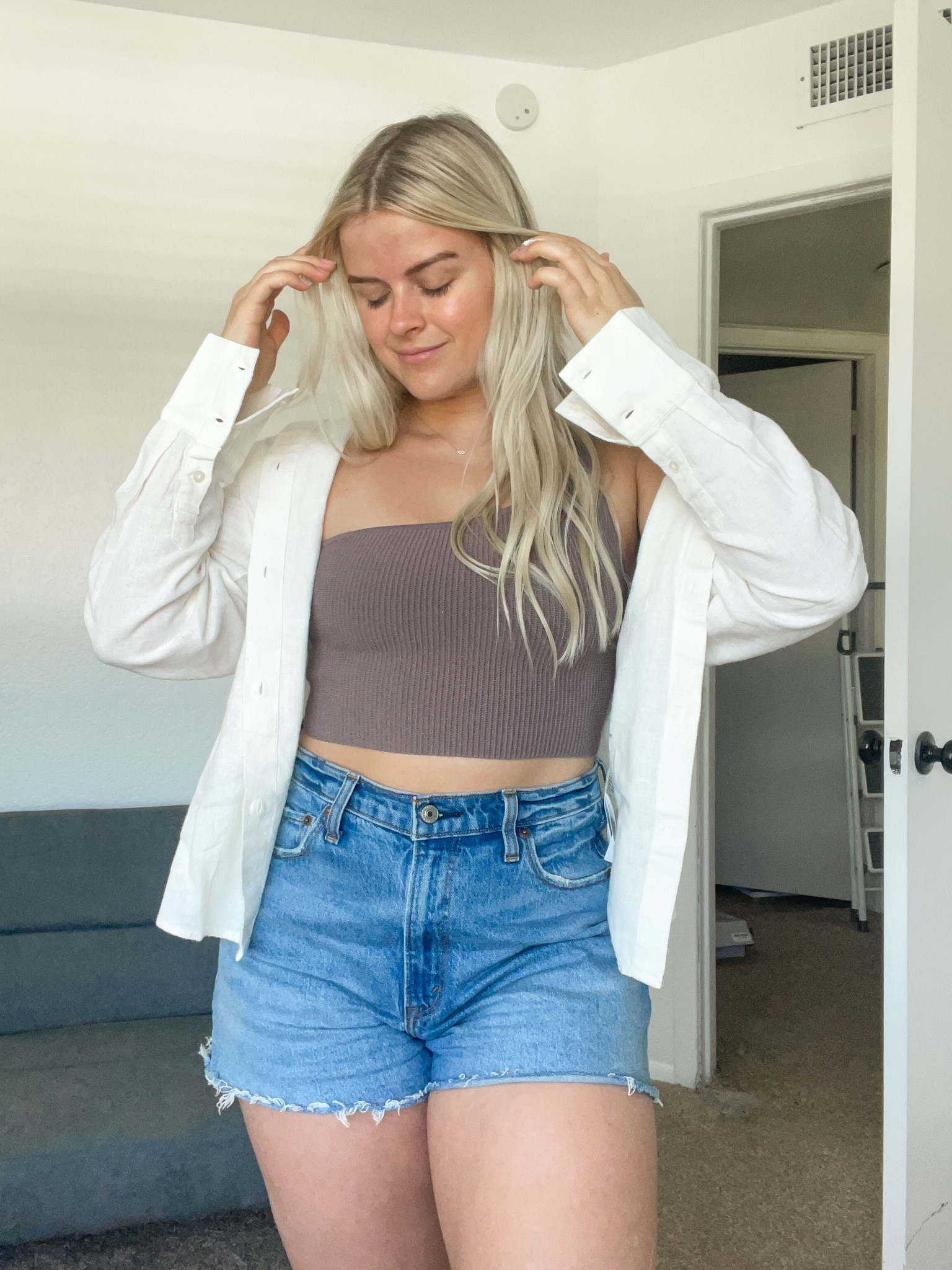 Obsessed with button down shirts lately. Sized down in the overshirt to a S and size 10 in the shorts! Tank is from Aritzia 🫶🏼

#LTKunder50 #LTKfit #LTKFind