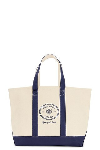 Sporty & Rich x Hotel Du Cap Eden Roc Eden Crest Two Tone Tote Bag in Natural - Cream. Size all. | FWRD 