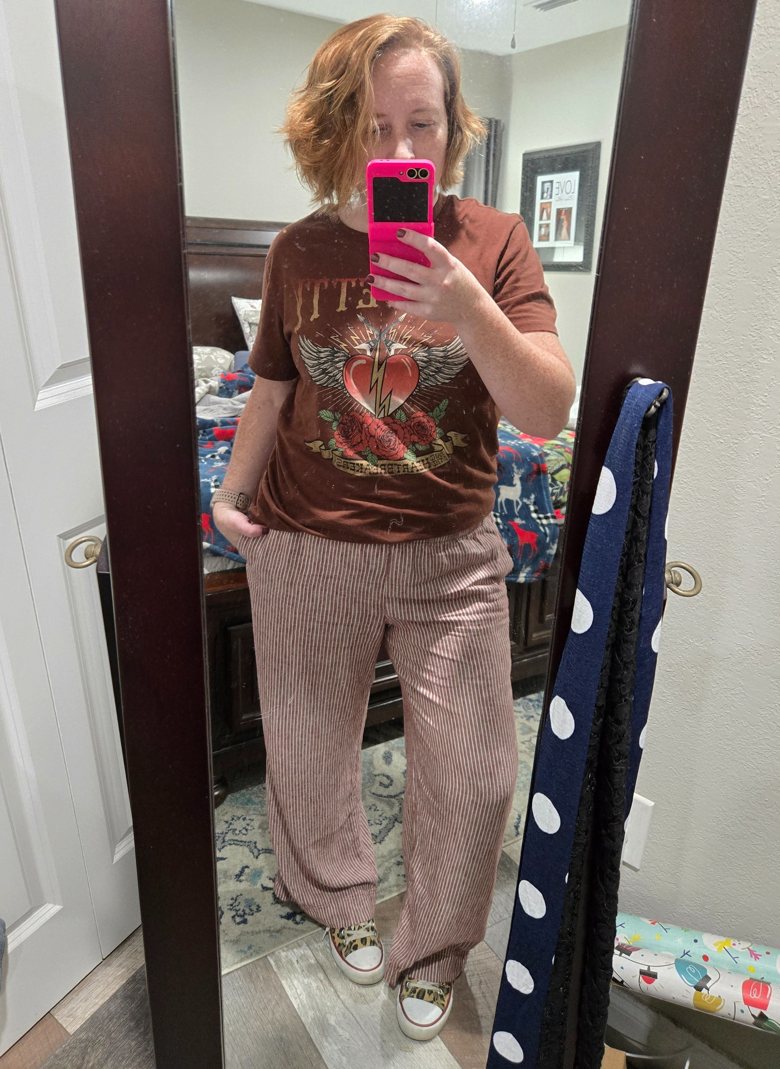 I threw this look together to go to dinner with my husband at a sports bar. My Tom Petty concert tee is one of my favorite shirts to wear. You can find them on Poshmark, so I linked to one there. Otherwise, I'm sharing two others that I like and that would work well with these pants. 

 #LTKPetite #LTKStyleTip