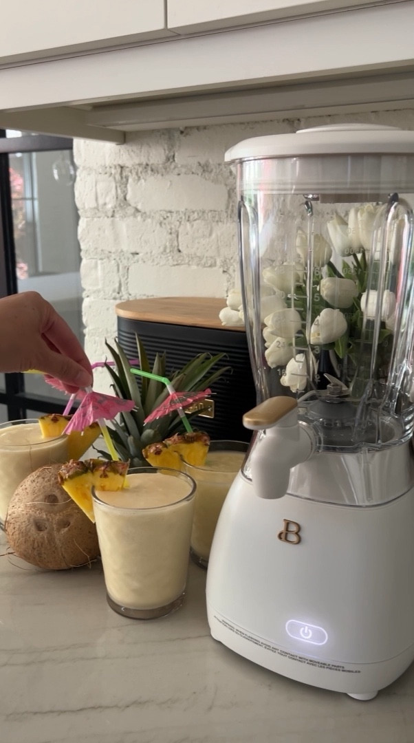 Summer Frozen Drinks on repeat!  I love this drink maker from the @walmart Drew Barrymore Beautiful Collection!  Head to my IG reel for the full recipe for my favorite pina colada! 

#walmartpartner #walmartgrocery #welcometoyourwalmart

#LTKkids #LTKhome #LTKfamily