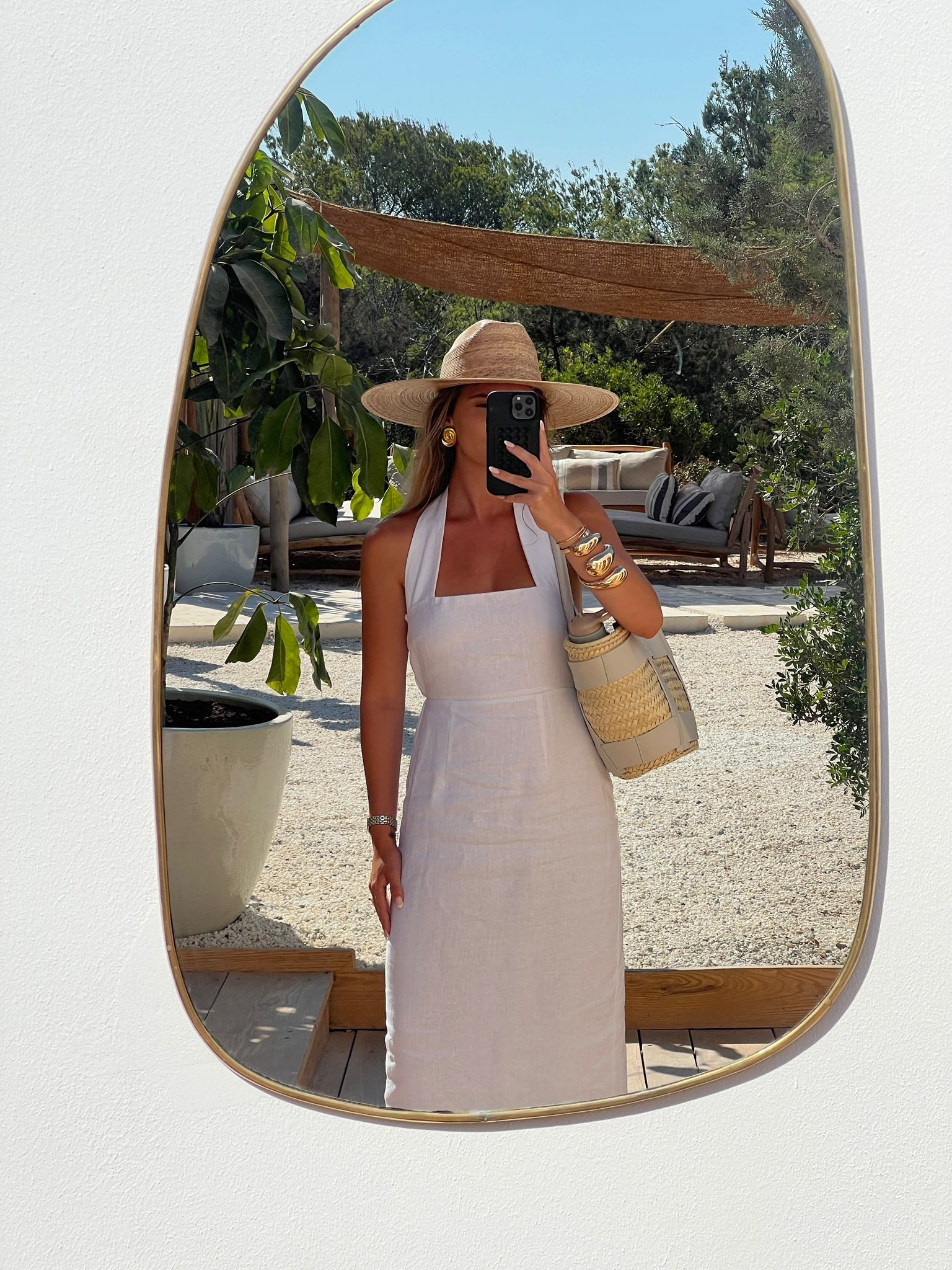 Summer style in Ibiza 

Dissh dress / demellier bag / basket bag / woven bag / woven hat / halter neck dress / white maxi dresss
