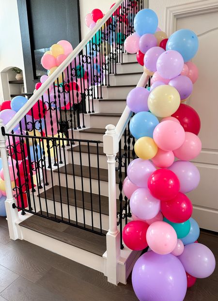 Amazon balloon garland! Bought a bunch of balloon packs and used fishing line to string it together and tie to the stairs. Balloon pump is key!! 

(Balloon garland stairs, party decor, birthday party, 3rd birthday party, girls birthday, pink balloons, toddler birthday, toddler party idea, third birthday party party decor, diy balloon garland, birthday party theme, cookie decorating) 

#LTKkids #LTKhome #LTKunder100