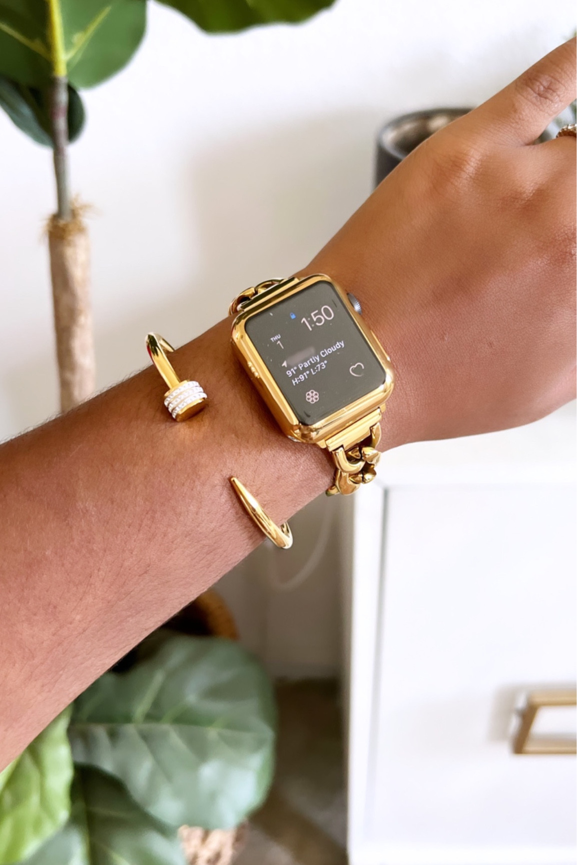 Gold Apple Watch Band with metal chain & links. I bought both the band set with the cover and an additional cover to replace the one in the set. The cover in the set has rhinestones in it, which I didn’t love. I wanted a more simple look. This protector cover has a matching gold finish and a screen protector. 

#LTKunder50 #LTKunder100 #LTKSale