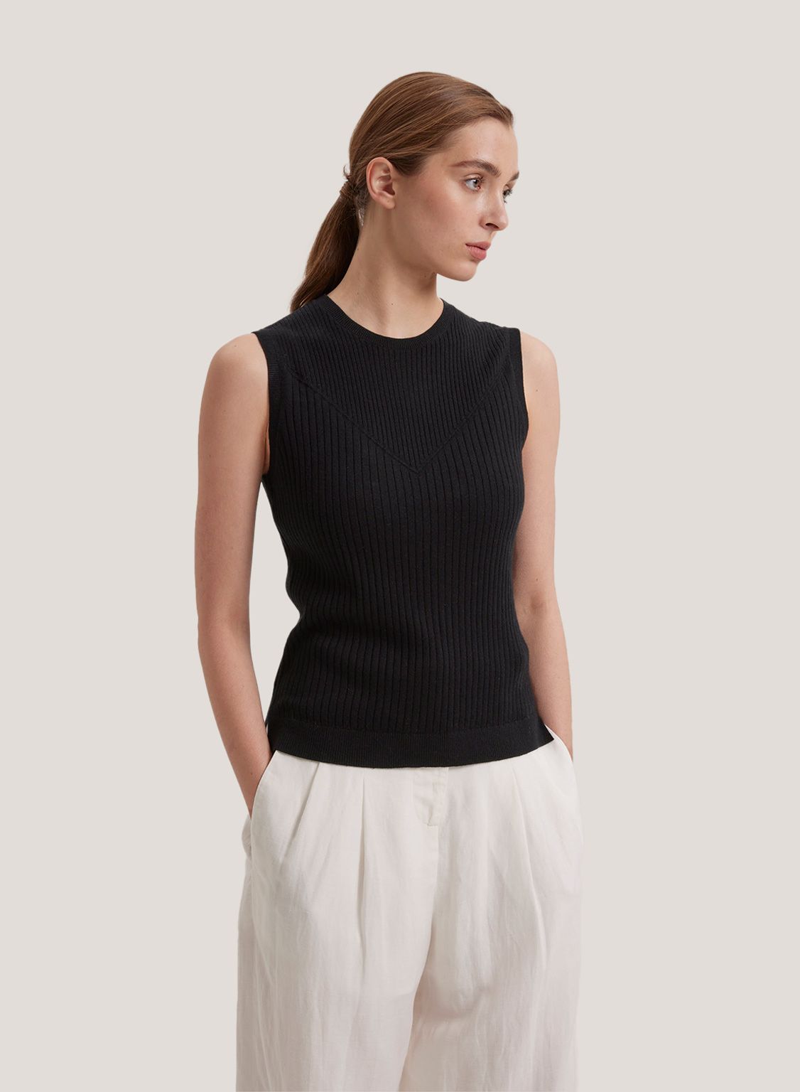It’s all in the details. This tank craft with an intricate ribbed crew-neck design, this top lo... | Gentle Herd