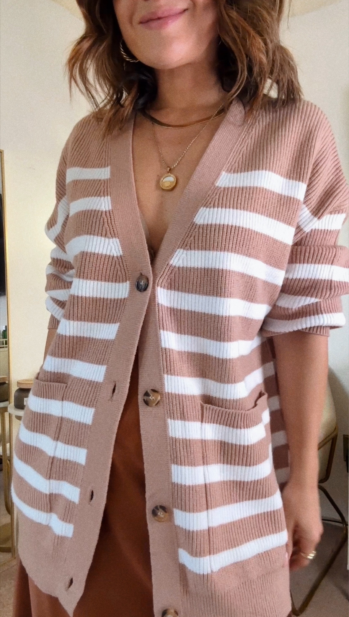 The cutest stripe cardigan via Amazon! It’s so cozy and comfortable! 
It runs big, do not size up. I’m wearing size xs. 

#LTKSeasonal #LTKFindsUnder50 #LTKFindsUnder100