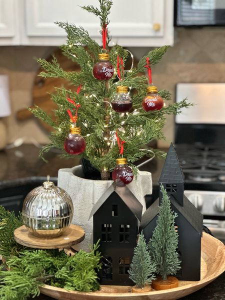 A fun entertaining idea with shot glad ornaments. Fill with your favorite shot and decorate on a tree with holiday decor like trees, houses, greenery and candles 

#LTKSeasonal #LTKhome #LTKHoliday