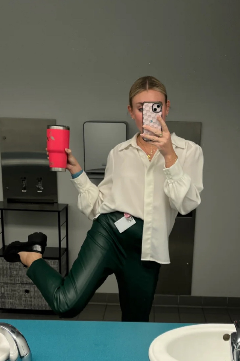 trendy doesn’t have to be uncomfy! Pairing leather legging-ish pants with an oversized blouse looks chic without ever trying. 