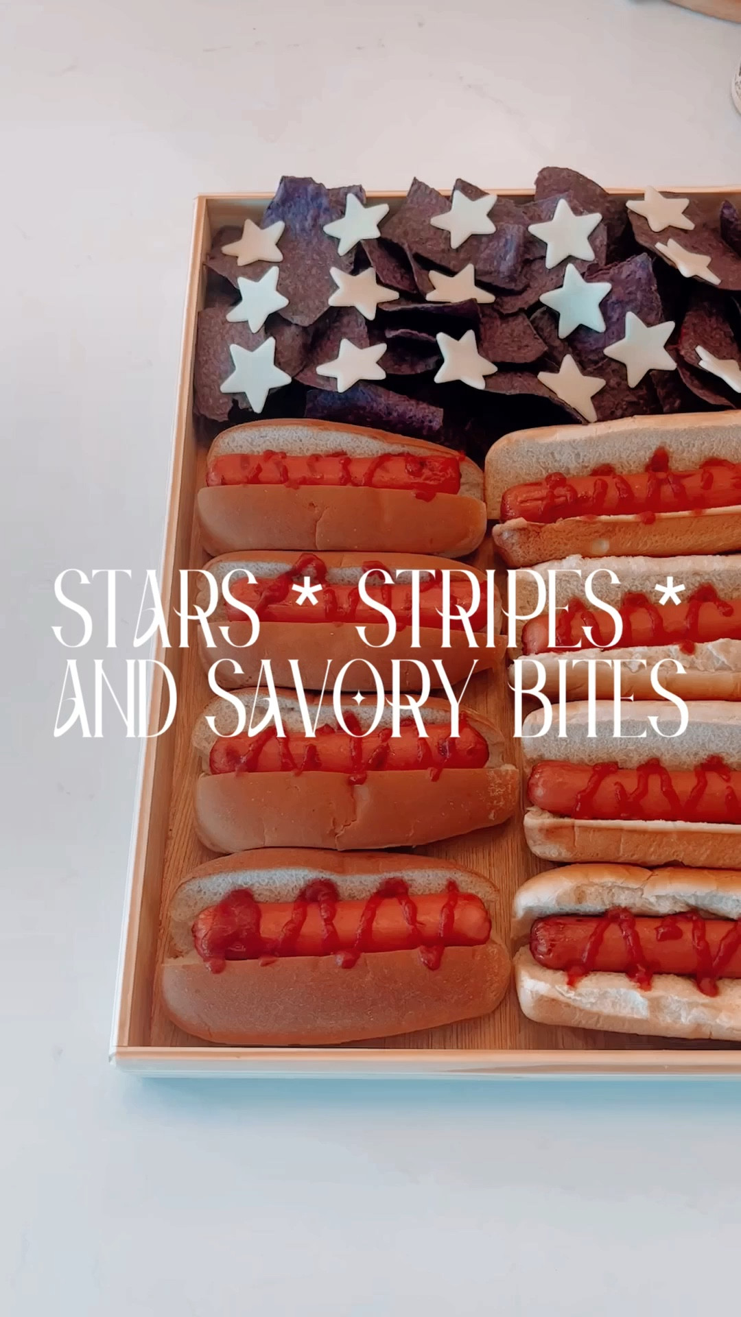 Get ready to rock your Independence Day bash with a seriously cool and easy presentation: the Hot Dog American Flag! It's like turning your BBQ into a patriotic party that'll make everyone go, "Wow!"
Here's the scoop: I fired up my awesome Ninja Grill (it's my secret weapon when I don't feel like going outside) to grill those hot dogs to perfection. While they were sizzling away, I popped the bread in to get it nice and toasty. Gotta have that perfect combo of soft bread and juicy dogs, right?
But wait, there's more! I got a little artsy and used a cookie cutter to make some mozzarella cheese stars. Now, let's assemble the flag!
Take the bread and split it right down the middle, making sure it's all nice and even. That's gonna be our delicious stripes. Then, plop those mouthwatering hot dogs right on top, like a work of edible art.
Now, for the finishing touches. Squeeze on some ketchup, because a hot dog without it just isn't the same. And here comes the magic—blue tacos! These crunchy treats are gonna be our star-spangled corner. 
Sprinkle those mozzarella cheese stars right on top of the tacos. Imagine the burst of cheesy goodness against that vibrant blue background. Ta-da! You've got yourself a showstopper presentation! It's like a burst of patriotic flavor and fun! So go ahead, dig into the Hot Dog American Flag, and let the stars and stripes make your taste buds do a happy dance. 😉


#LTKSeasonal