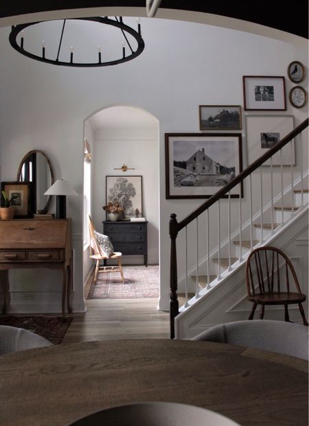 Foyer inspo, gallery wall, thrifted furniture, vintage modern style, sherwin williams pure white, large tree sketch, stairwell ideas 

#LTKunder100 #LTKunder50 #LTKhome