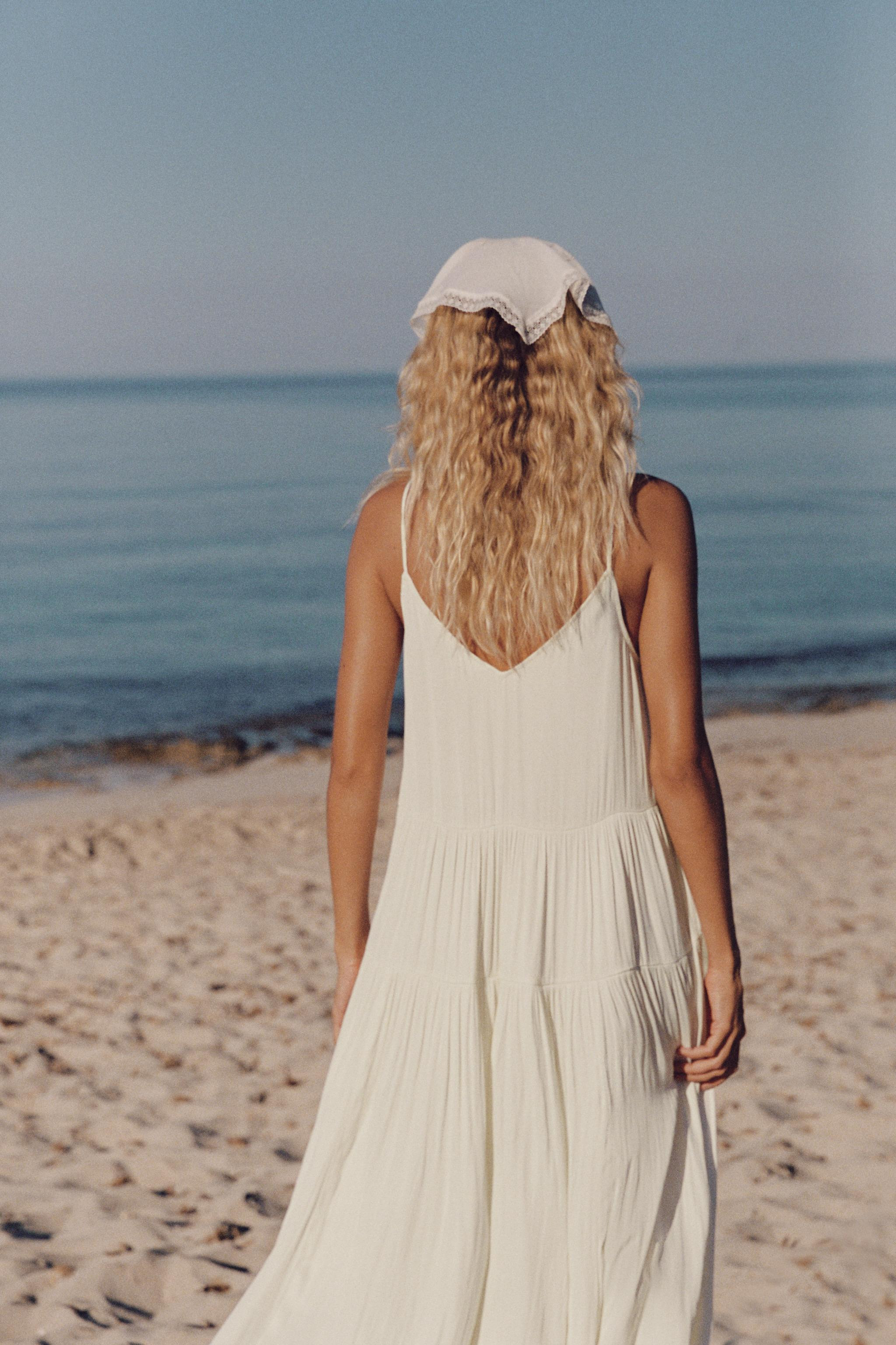 Model height: 181 cmV-neck dress featuring tie detail and adjustable thin straps. Gathered detail... | Zara UK