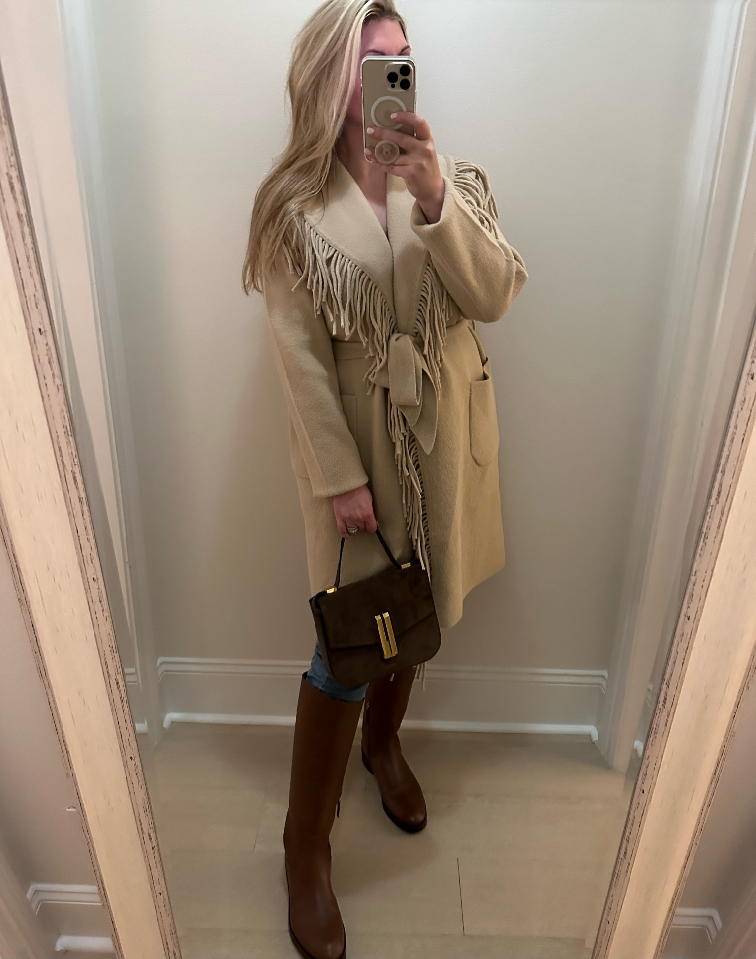 Such a fun fringe coatigan! I overnighted this color and black. Black already sold out and only a few sizes left in this color. Western style boots preppy Texas turquoise 

#LTKitbag #LTKstyletip #LTKCon