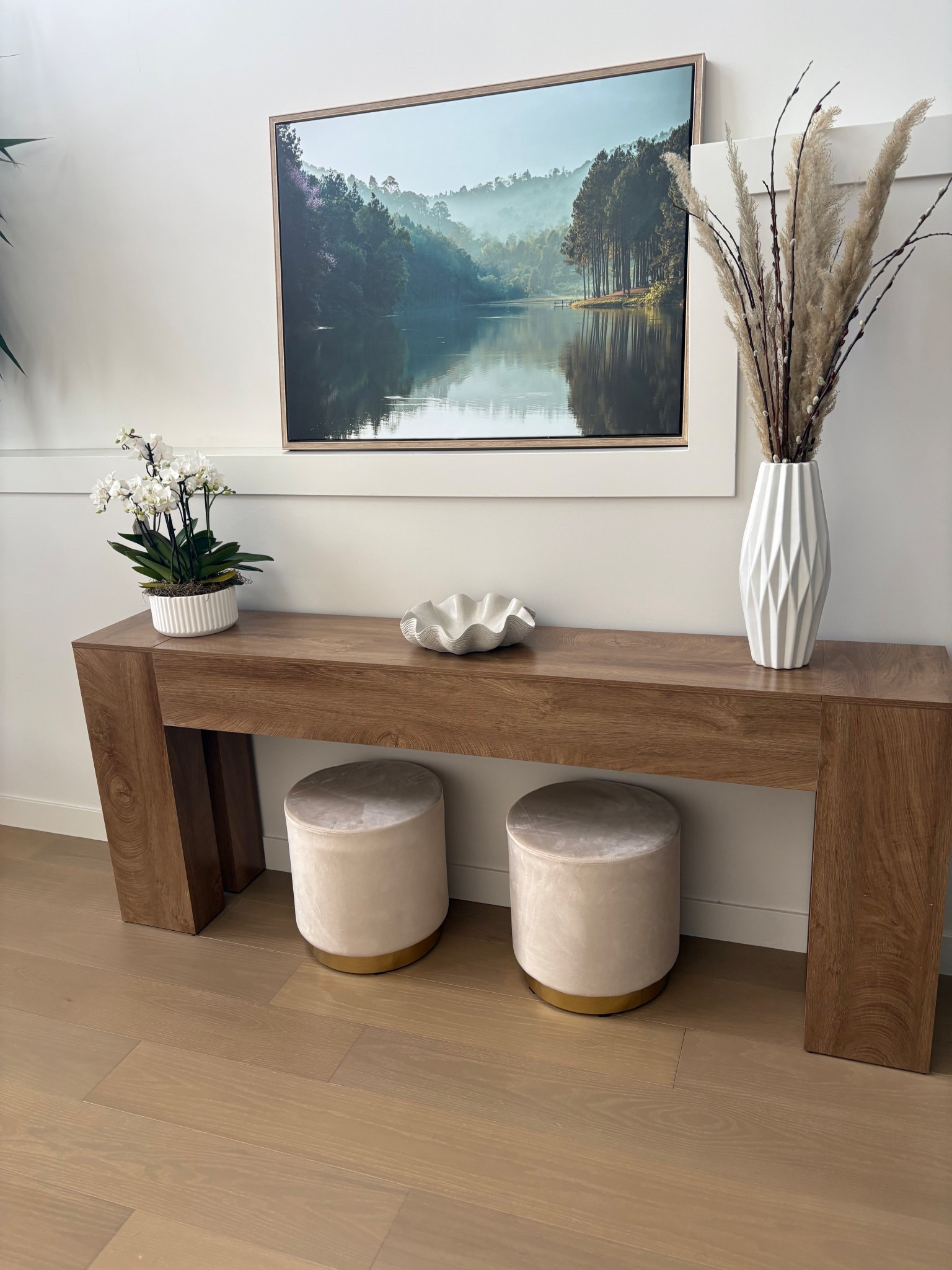 Entryway goals unlocked ✨ This warm wood console table + those plush velvet ottomans with the gold bases are giving me all the calm, elevated vibes. Perfect for dropping keys, styling a little moment, or sneaking in extra seating. Obsessed with how it ties the whole space together!
Links below 👇

#LTKhome #LTKcanada #LTKstyletip