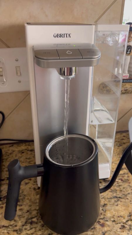 Countertop water filtration dispenser - fills cups, water bottles, and even the electric hot water kettle! Dispense exactly 12 oz, 20oz. or press/hold the button.

 I find myself using this kettle more often than I ever expected! We use it for heating water for tea, instant noodles, faster easy mac!

#LTKxPrimeDay 

#LTKhome #LTKBacktoSchool #LTKfamily