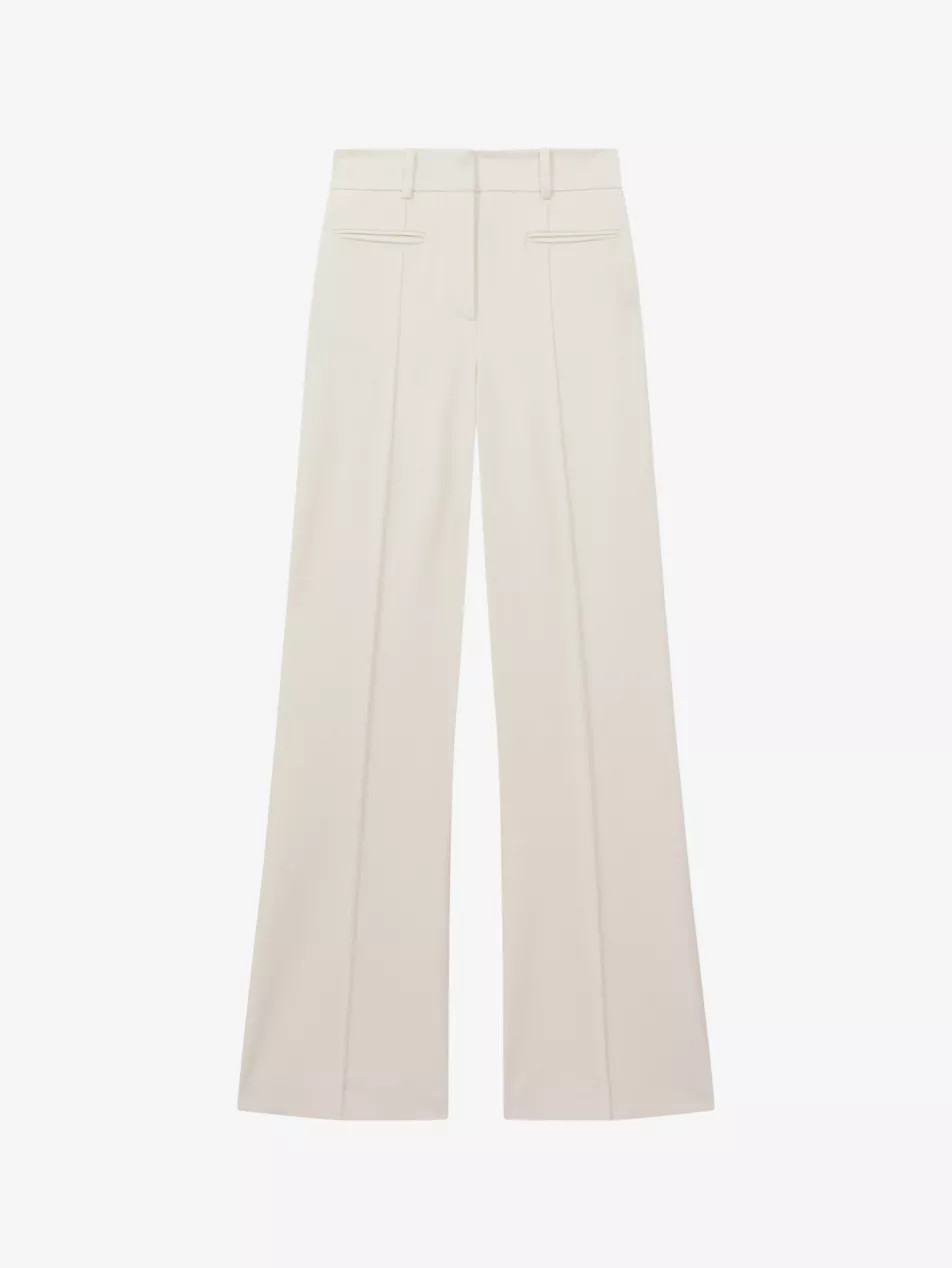 Claude pinched-seam flared-leg high-rise stretch-woven trousers | Selfridges