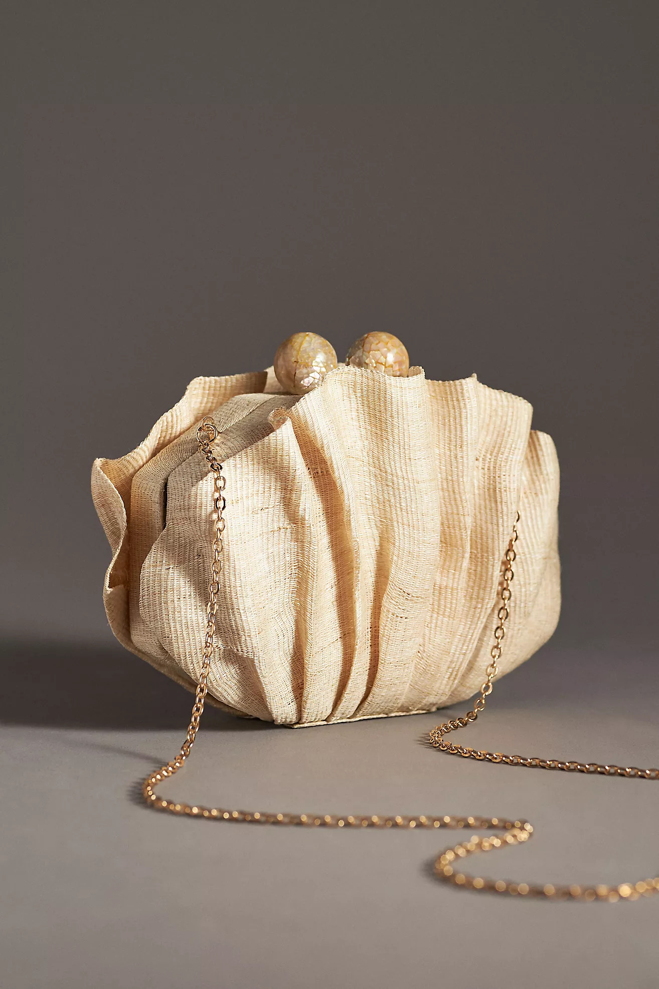 POOLSIDE Origami Scallop Straw ClutchPOOLSIDE
  


  


  


  


  

1 Review Reviews$345.00 | Anthropologie (US)