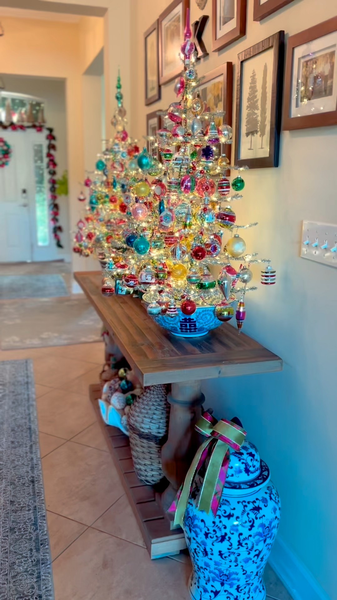 🎄Check out my sister’s vintage tinsel trees! She decorates these every year!
She adds vintage ornaments and they look amazing in her hallway!

🎄Love the tinkling lights too! So festive and colorful!

🎄Also linking similar garland and front door wreath!

#LTKSeasonal #LTKFindsUnder100 #LTKOver40 #LTKHome #LTKSaleAlert #LTKFindsUnder50 #LTKGiftGuide #LTKvlog