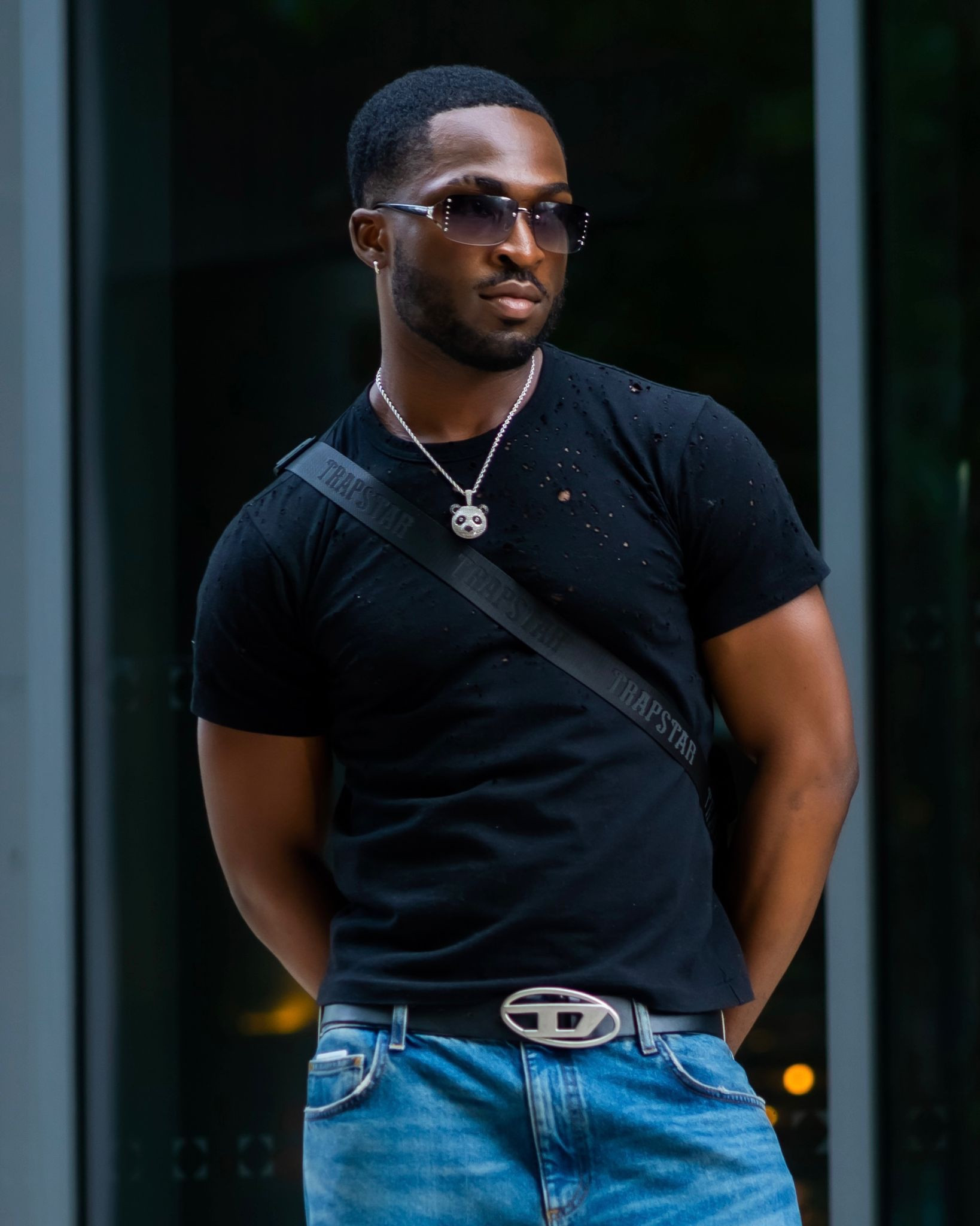 Men fashion, black tee, t-shirt, men trapstar bag, blue jeans, brown sunglasses, silver chain, diesel belt 

#LTKmens #LTKSeasonal #LTKeurope