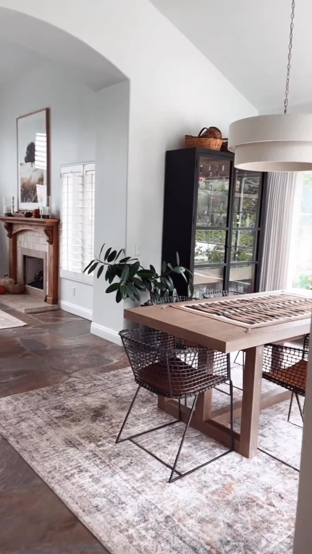 Dining room views with the Portola Extension Dining Table, the Delaney Drum Pendant, the Carly Curio Cabinet and my beautiful soft dining room area rug. 

#homedecor #fallhome #neutral #decor 

#LTKStyleTip #LTKHome #LTKSaleAlert
