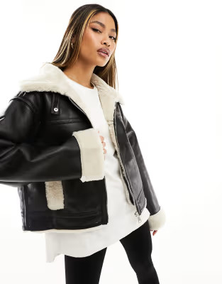 NA-KD faux fur bonded jacket in black | ASOS (Global)