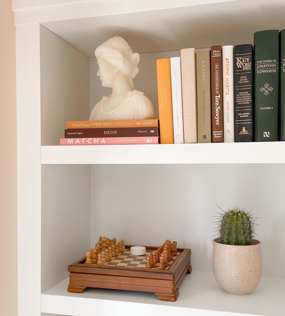 my new pretty lady to make this shelf area a little more interesting ✨ she is actually a HUGE candle but we ain’t gonna burn her! 

#LTKunder50 #LTKhome #LTKSeasonal