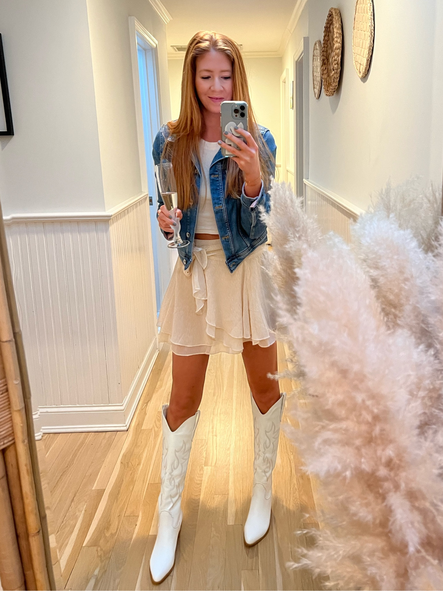 Coastal cowgirl summer ready in this flirty $15 wrap skirt & these comfy and cute white cowboy boots! 

#LTKunder100 #LTKunder50