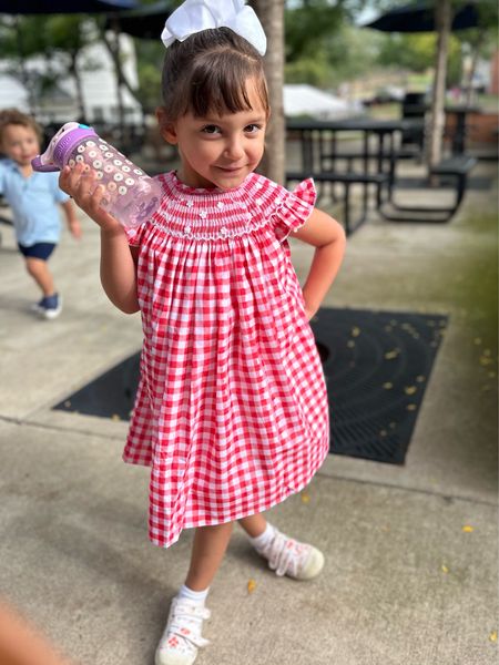 Finally got this girl in a dress! Love this gingham little girls dress from poppy 

Code: blameitondede for 20% off

#LTKfamily #LTKkids