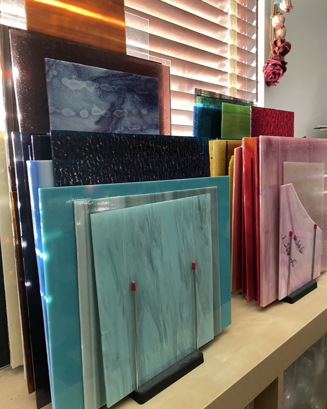 Sharing my favorite stained glass organizer. ✨ I love how much glass it holds and how easy it is to use. ✨ I also like how my sheets of stained glass add color and interest to my studio space, especially when the window light is coming through them. ✨ For mosaic tips, tutorials, inspiration, and so much more please visit my YouTube channel: YouTube.com/julieweilbacher. Follow @julieweilbacher on Instagram for all things mosaic art. stained glass - mosaic - glass art - craft supplies storage - glass crafts - mosaic art

#LTKFindsUnder50 #LTKHome