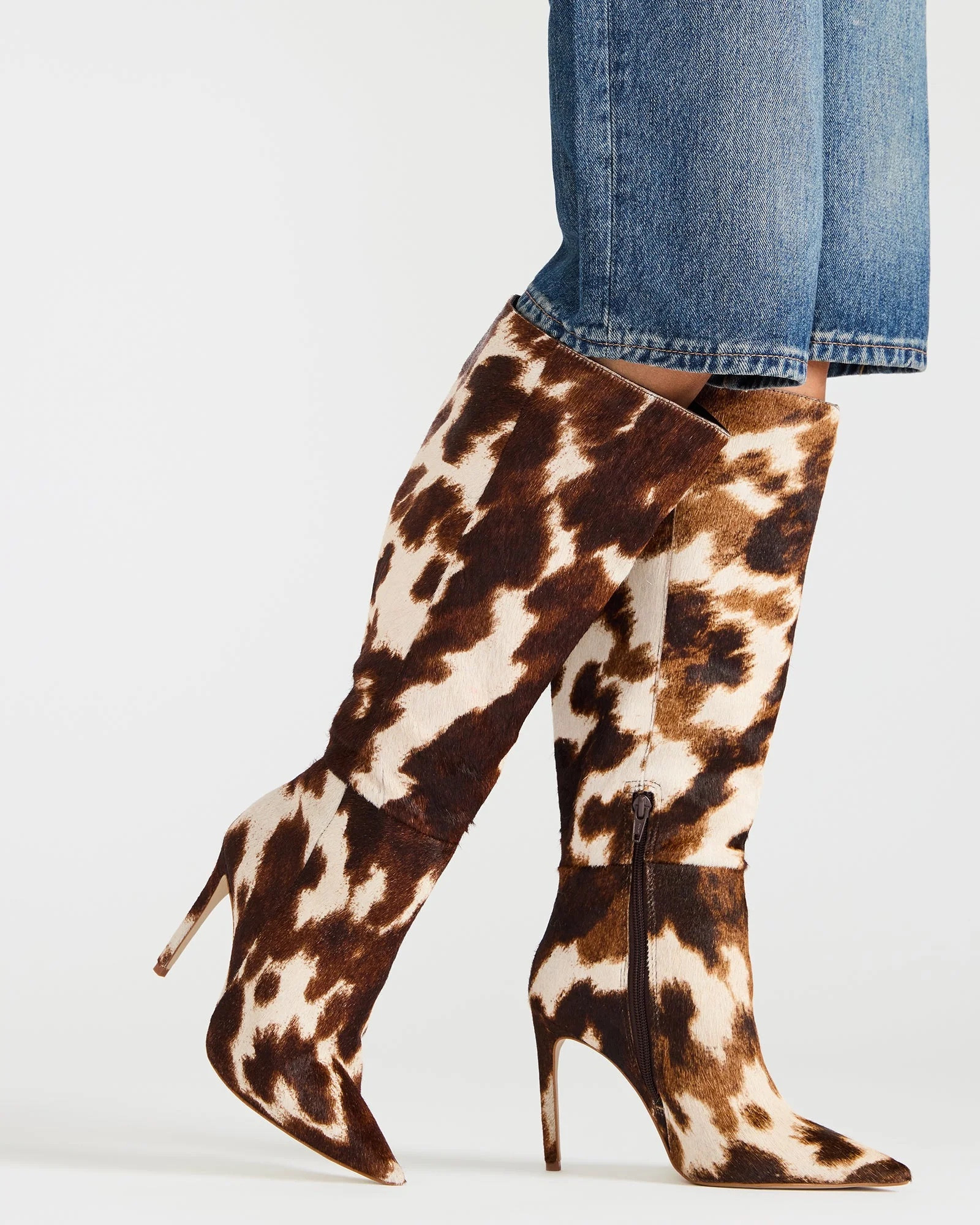 @coachsydcarter inspired me to find some stiletto cow print boots & the “nitro brown” cow print boots by @stevemadden are now 25% for $189.99. 

#LTKSaleAlert