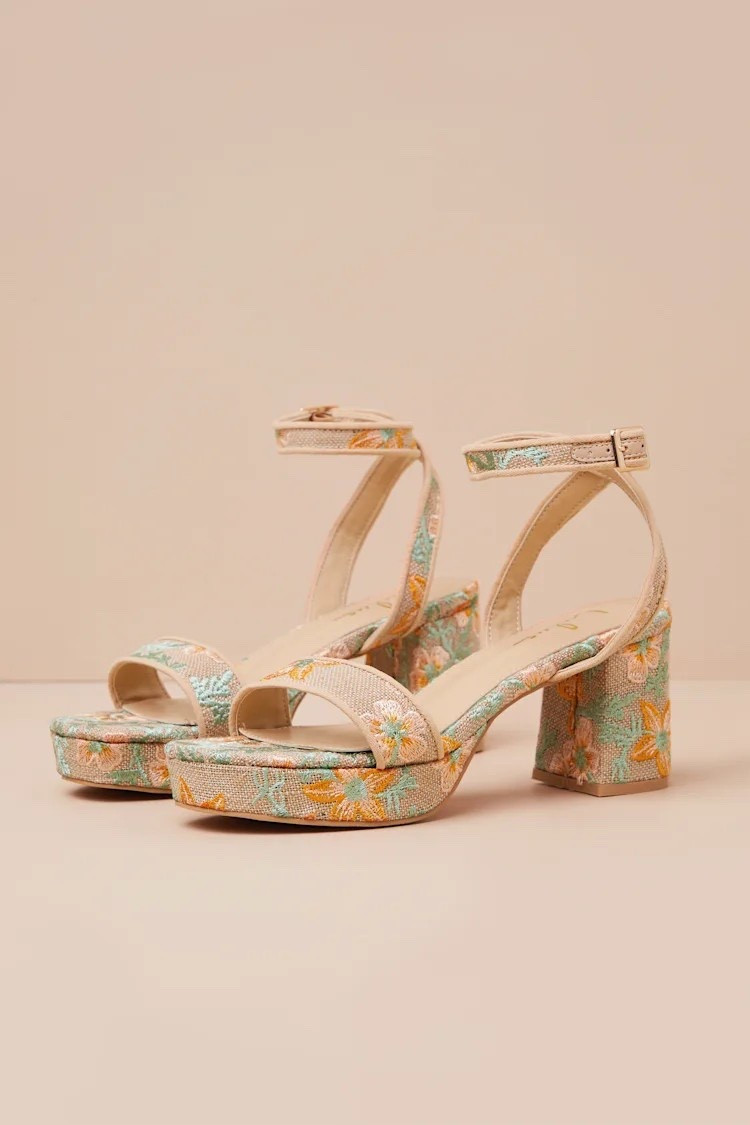 Get ready for exquisite dates nights in the Elodina Multi Floral Raffia Platform High Heel Sandals. These raffia-wrapped heels feature cute floral embroidery that adorns the almond-shaped footbed, a wide toe strap, and an adjustable ankle strap that secures with a gold buckle. A trendy platform sole and an easy-to-wear block heel complete the design. Under $50.

Heel height: 3” 

Keywords: Spring heels, spring vacation, spring break, date night outfits, women Easter outfits, women Easter dresses, date night heels, date night outfits, wedding guest, wedding guest heels, summer heels, vacation outfits, resort outfit, resort heels, sandal heels, mules



#LTKSpringSale 

#LTKTravel #LTKWedding