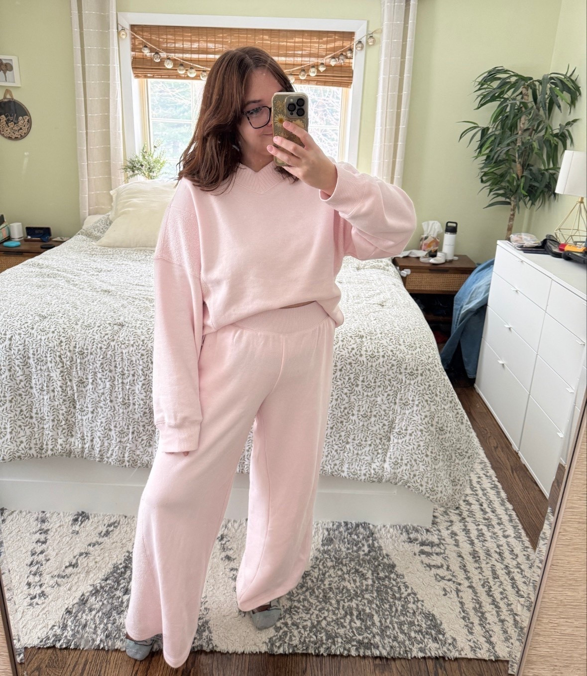 One pink matching set 2 ways. Tucked in the bra and let loose.

This aerie pink v neck sweatshirt runs true to size for once. I’m wearing a large.

The pink wide leg sweatpants run somewhat big. I did go with my true to size large, but got a short since they’re so long. The medium’s fit, but I didn’t like that they showed my belly as much.

This matching sweat set is the perfect travel outfit, errands outfit or loungewear for moms 

#ltkmomlife #ltkseasonal #ltkmidsize

#LTKSaleAlert #LTKFindsUnder100 #LTKFindsUnder50