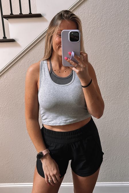 Shop my outfit! Love love these little cotton tanks from Amazon for casual/athleisurewear! I wear size medium! Layered w the Free People bra tank (size small)! 

These are my FAVORITE athletic shelters. Lululemon 4 inch tracker shorts 🙌🏼 Wear my true size 6 in Lululemon  

#LTKfit #LTKunder50 #LTKstyletip