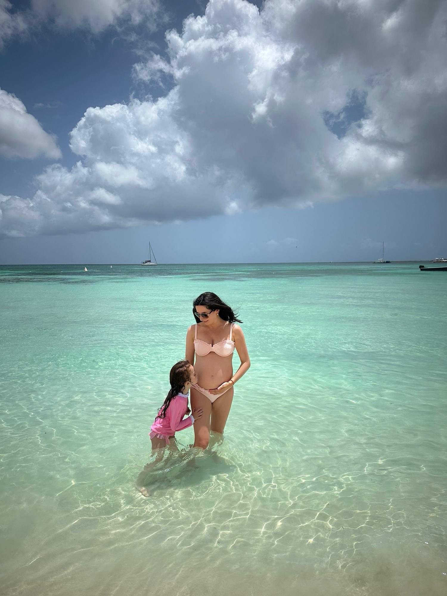 Wearing my pre pregnancy size in the bottom and went up one size in the top. 

Kylie’s sun shirt is perfect for breaks from the Aruba sun 

#LTKBump #LTKSeasonal #LTKKids