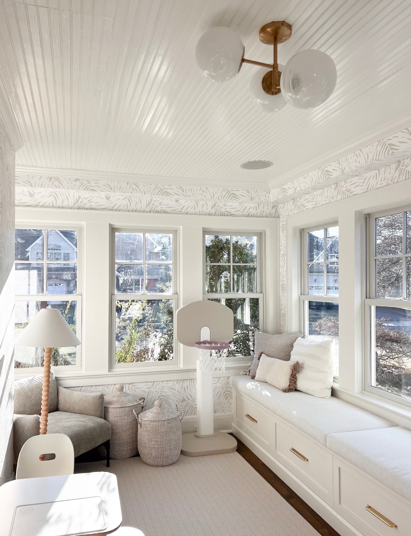 One of my favorite lighting updates in this space! This brass globe flush mount adds just the right amount of interest while still keeping the room feeling bright, airy, and timeless. A beautiful light fixture can completely transform a room and is always one of my favorite design investments.

lighting fixture, brass lighting, flush mount lighting, statement lighting, home decor, sunroom design, playroom decor, coastal home, interior design, home inspiration, GirlOnTheHudson

#LTKHome #LTKSeasonal