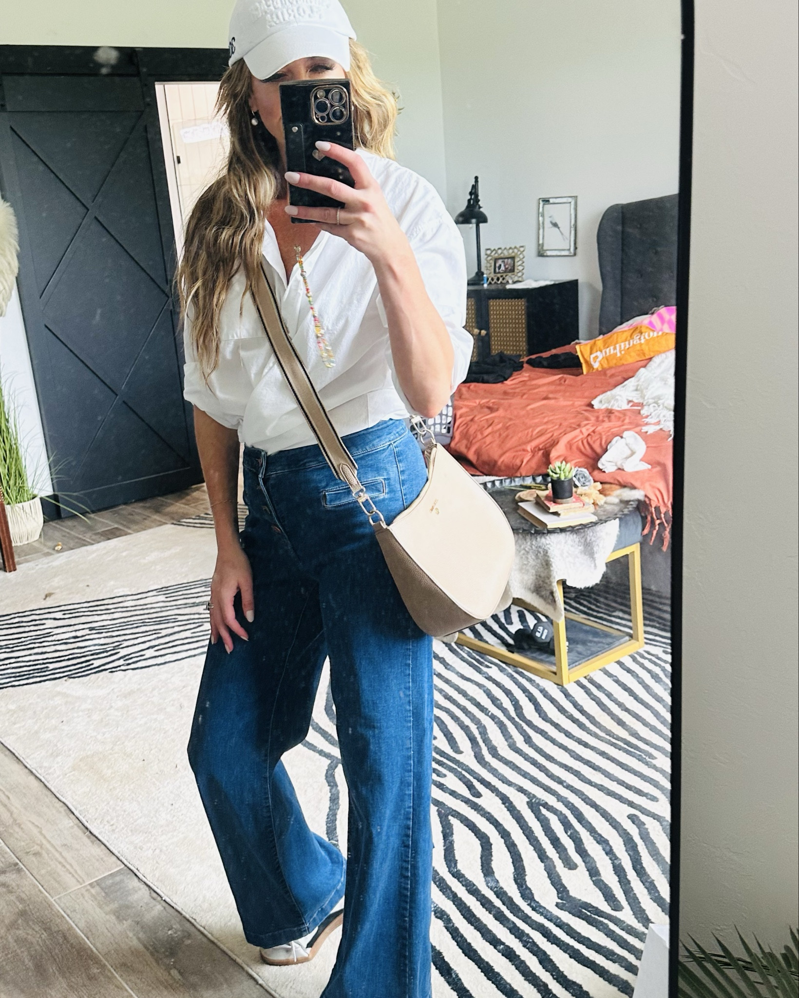 Proof that less really is more 🤍 Denim trousers + a crisp white button-up + a classic hat = timeless chic. Effortless, polished, and always on point.

#LTKMidsize #LTKFindsUnder100 #LTKFindsUnder50