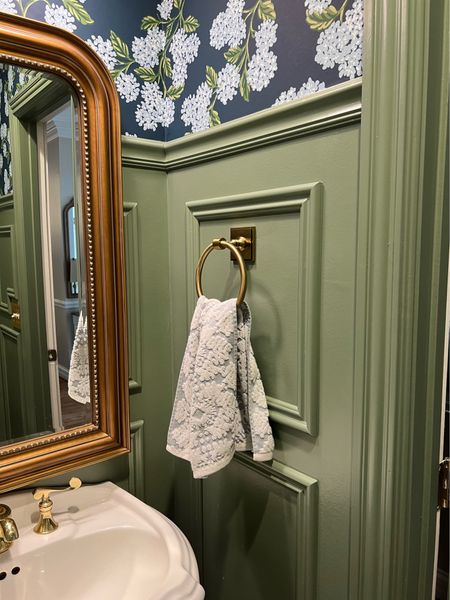 My powder room features brass hardware. It looks great with my hydrangea wallpaper and Calke green paint.

#LTKhome