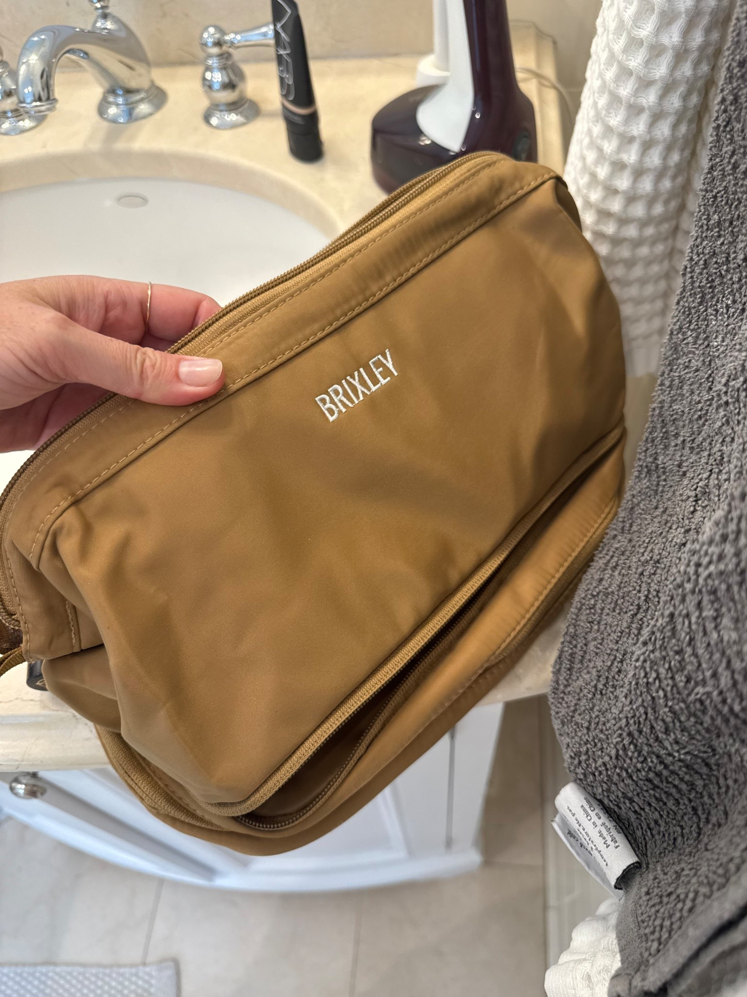 Love the size of this toiletry bag and has zipper compartments in the bottom for organizing. Use code SPRING10 for 10% off 

@Brixley Bags #ad