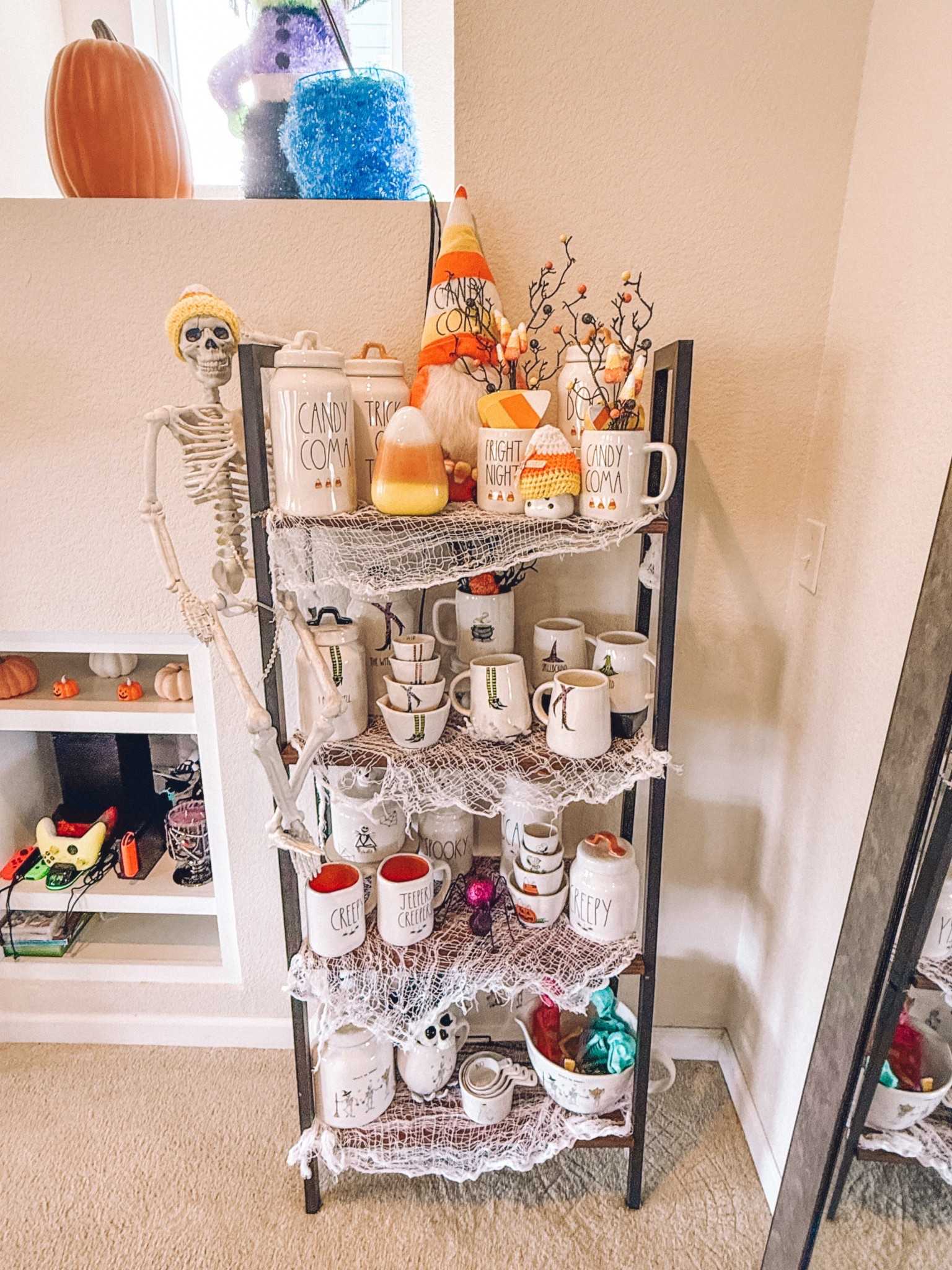 My white Rae Dunn Halloween decor!
This shelf usually lives in the basement closet but I bring it out for Halloween and Christmas to hold more decor 


#LTKStyleTip #LTKSeasonal #LTKHome