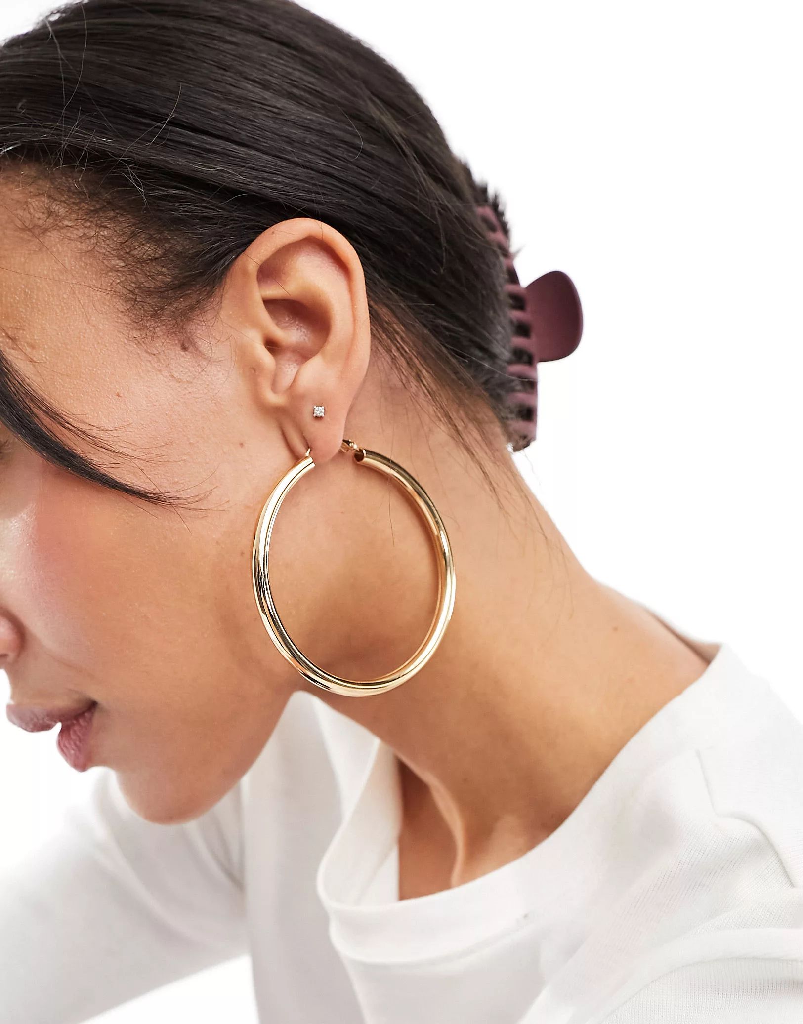 ASOS DESIGN 70mm hoop earrings in simple tube design in gold tone | ASOS (Global)