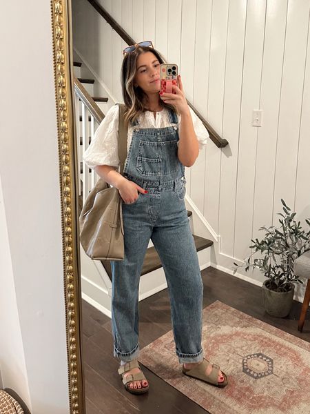 Small in the overalls but they are kinda snug! If you want more oversized go up! Medium in the top! 
