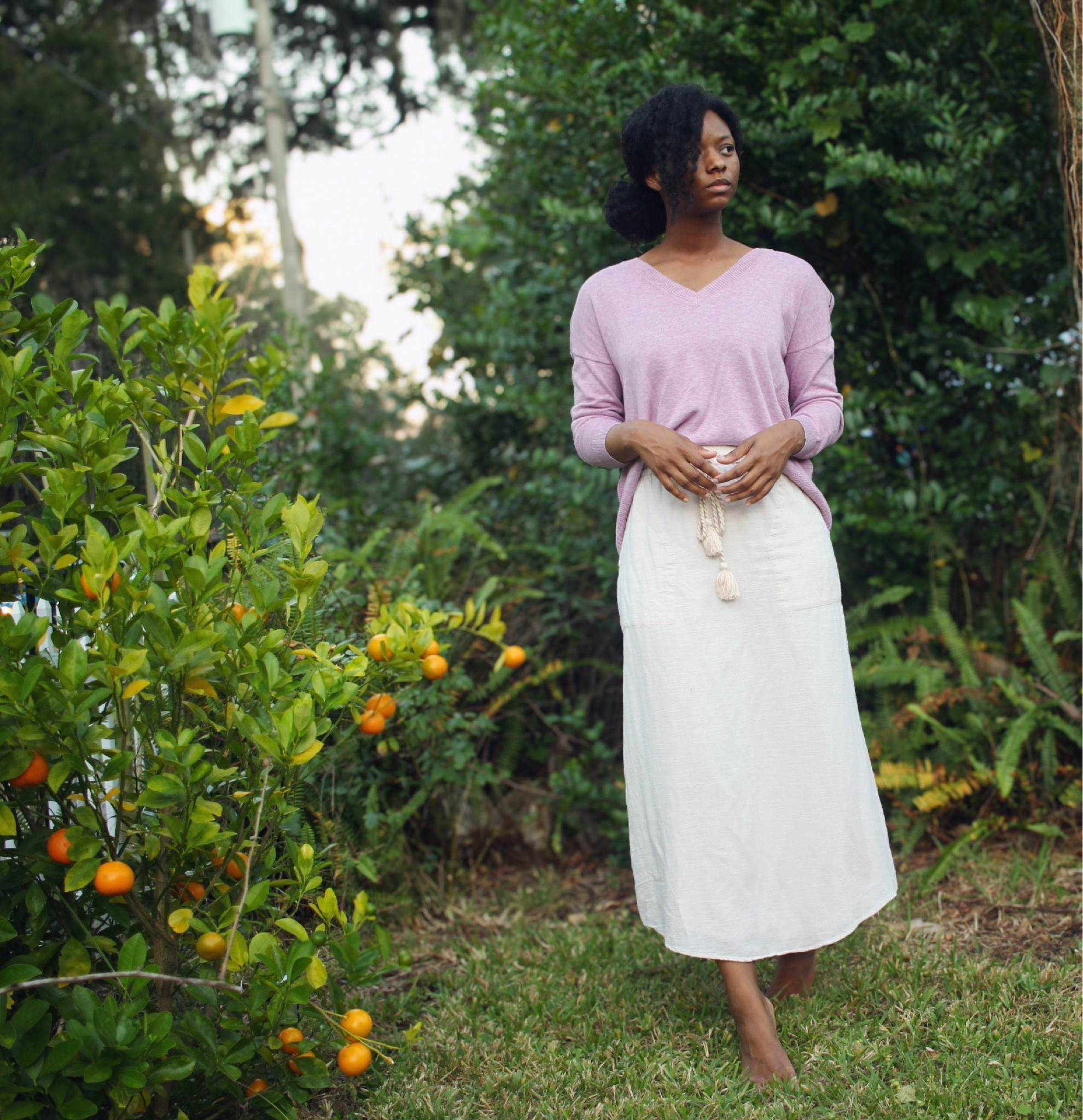 Lightweight sweater in this pretty lilac mauve color. It also has touches of olive green on the sleeve and back 

#LTKstyletip #LTKSeasonal