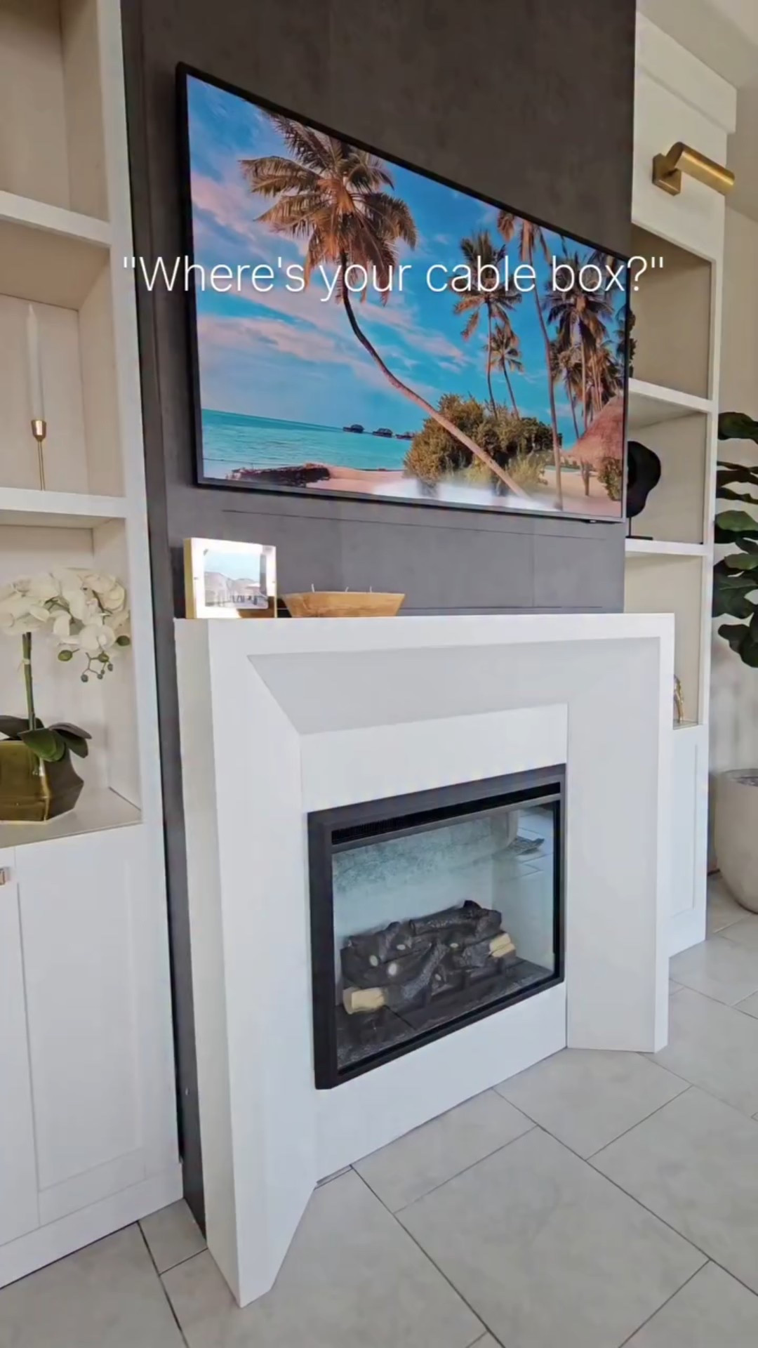 Do cords, routers, cable boxes, etc, annoy you to look at??? Something about looking at a ton of devices and cords work my nerves, lol. So it was mandatory to figure out a way to conceal as much as possible. Plus, my husband is such a techy and is likely to switch out devices often. Easy access is a necessity!  So this is what I came up with. 
.
#diyhome #fireplace #building #beforeandafter #diy #explore #hgtv #diyinspo #renovation #home #homereno #homeimprovement #homeproject #lowes #homedepot #modernhome #mantle #modernfireplace 

#LTKHome #LTKFindsUnder100 #LTKdayinmylife