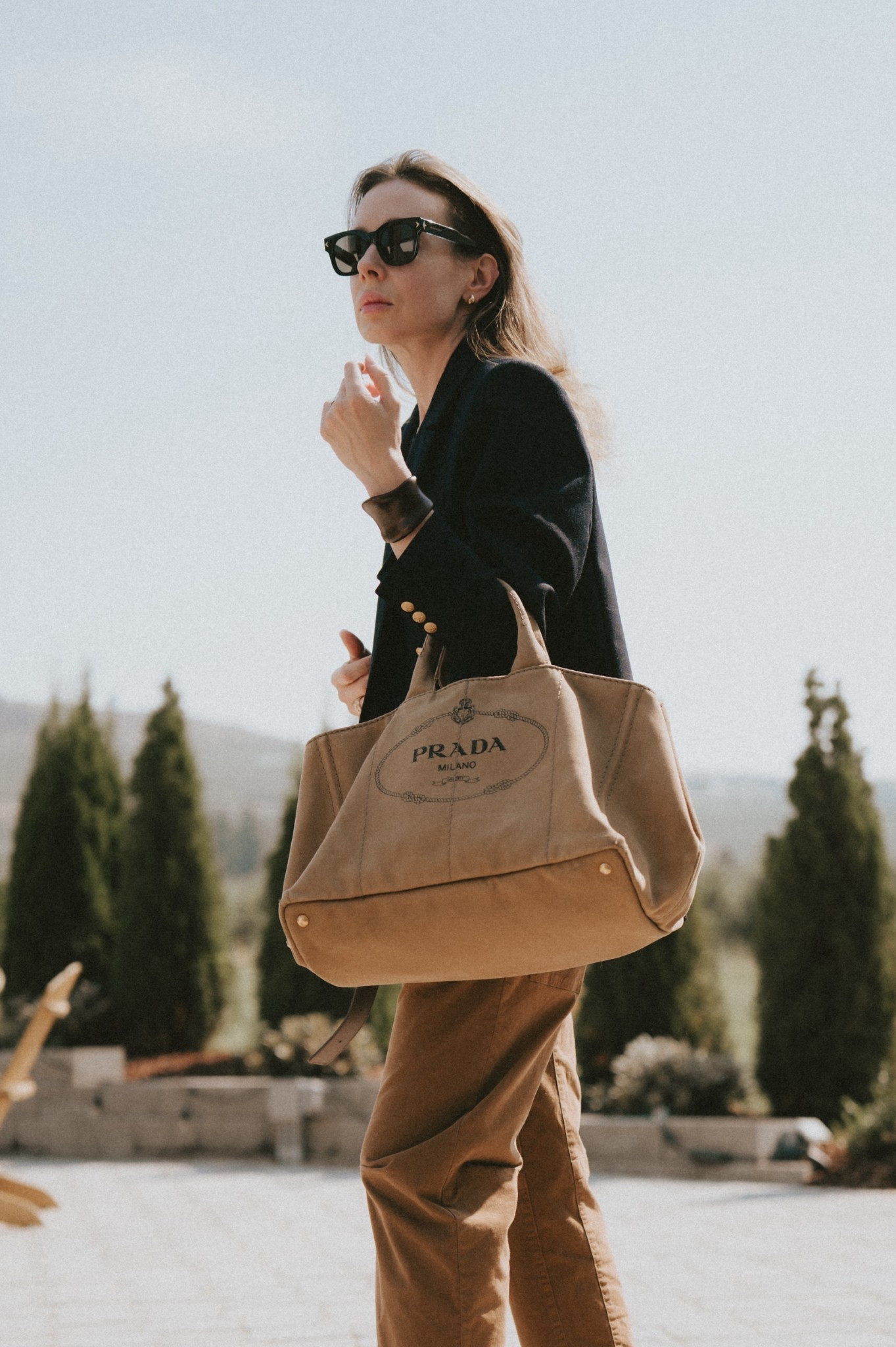 Accessorizing this navy blazer: sunnies, earrings & a statement bracelet. 

#LTKStyleTip #LTKItBag #LTKSeasonal