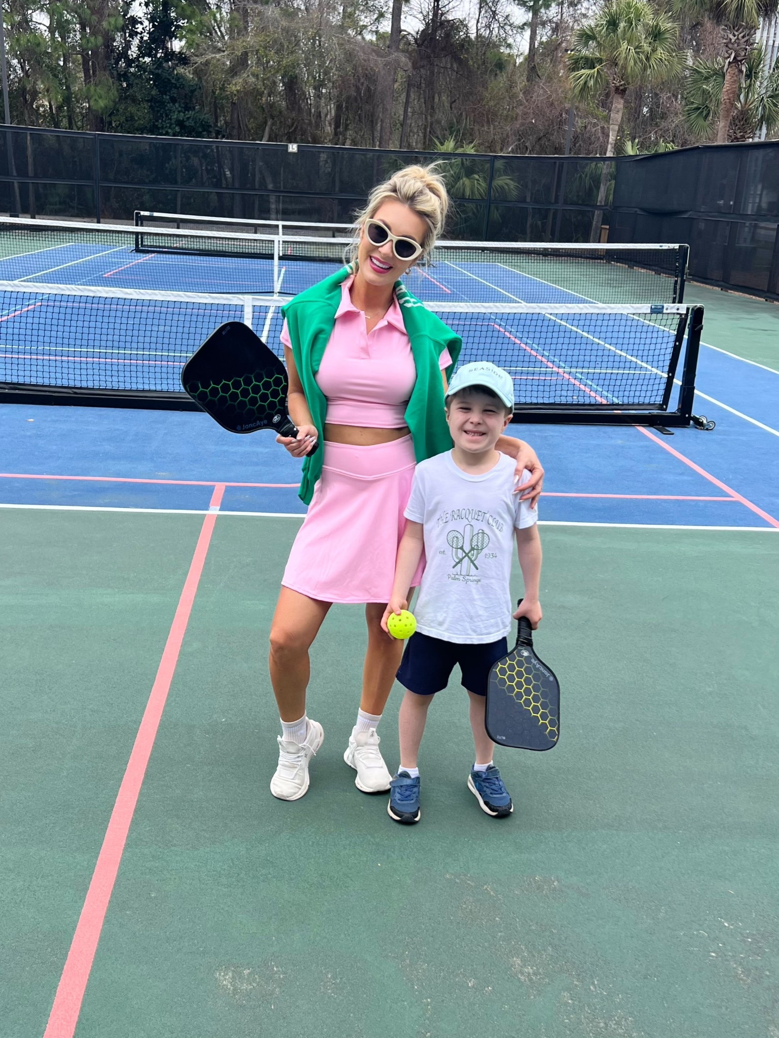 Pickle ball outfit. Wearing size small in pink set & green sweater. Size 6 in cloud nova ON sneakers. 

#pickleballoutfit #pickleballfit #tennisoutfit #tennisfit #tennisset 

#LTKFindsUnder50 #LTKStyleTip #LTKActive