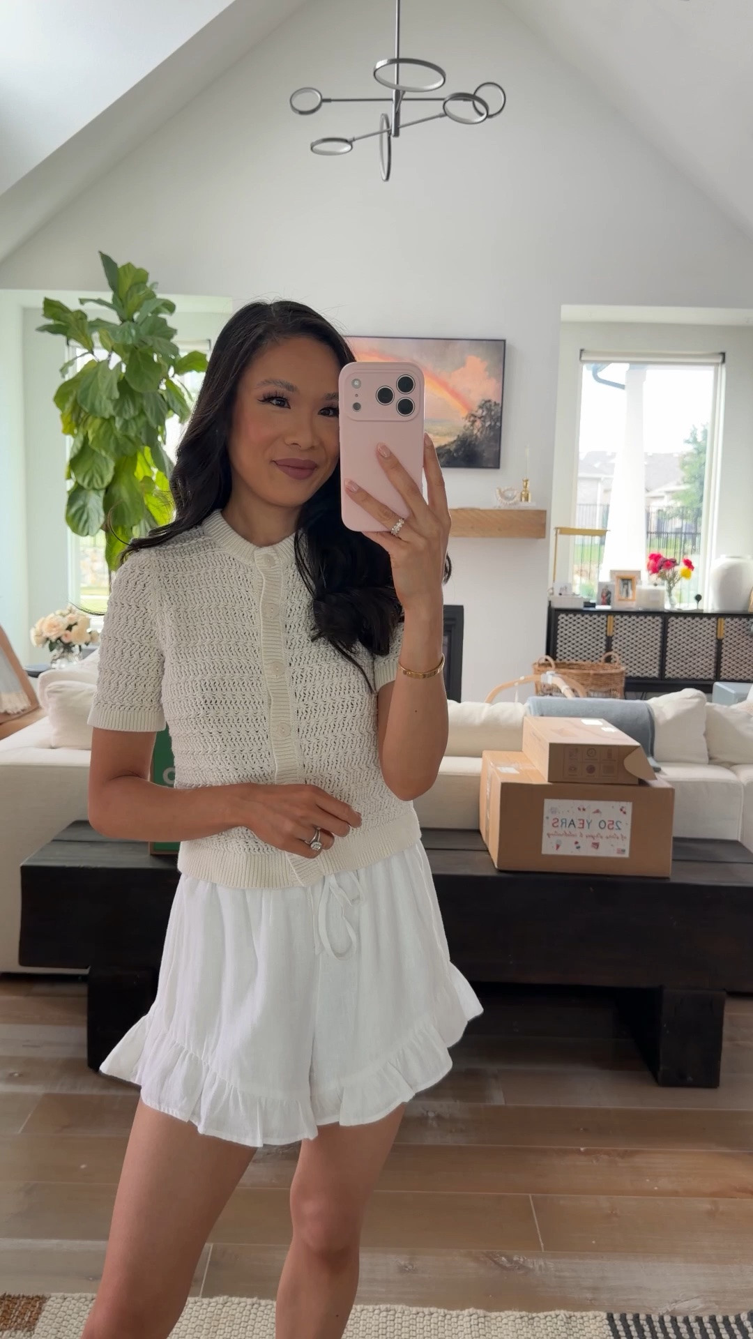 Easy elevated Mom outfit with a textured cardigan top and linen blend ruffle pull on shorts. Wearing size XS in both and they fit true to size. The shorts have pockets and are not sheer.

#LTKPetite #LTKSaleAlert